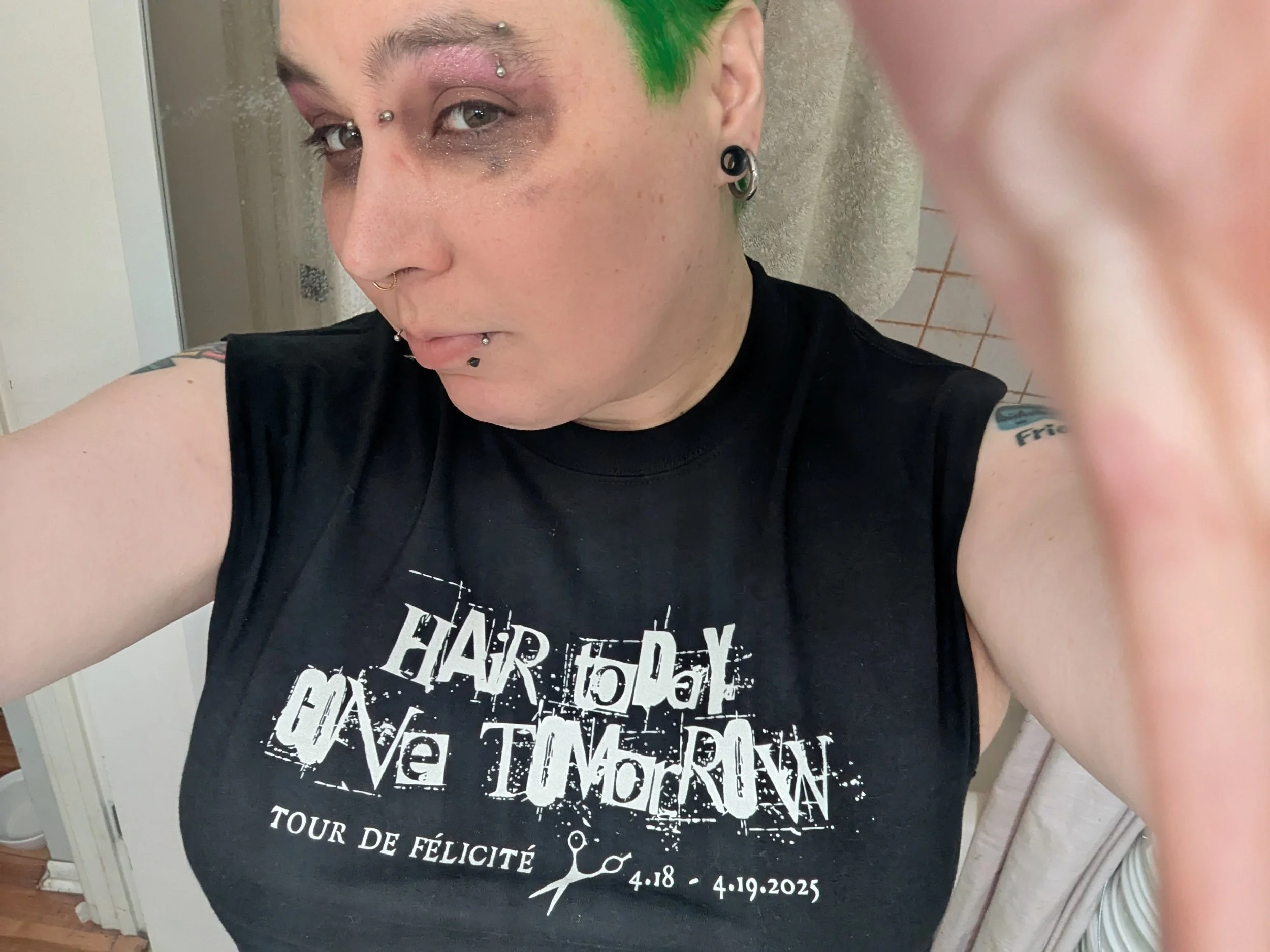 at home after the haircut. The makeup didn't fully come off in the shower so I look all smeary and streaky