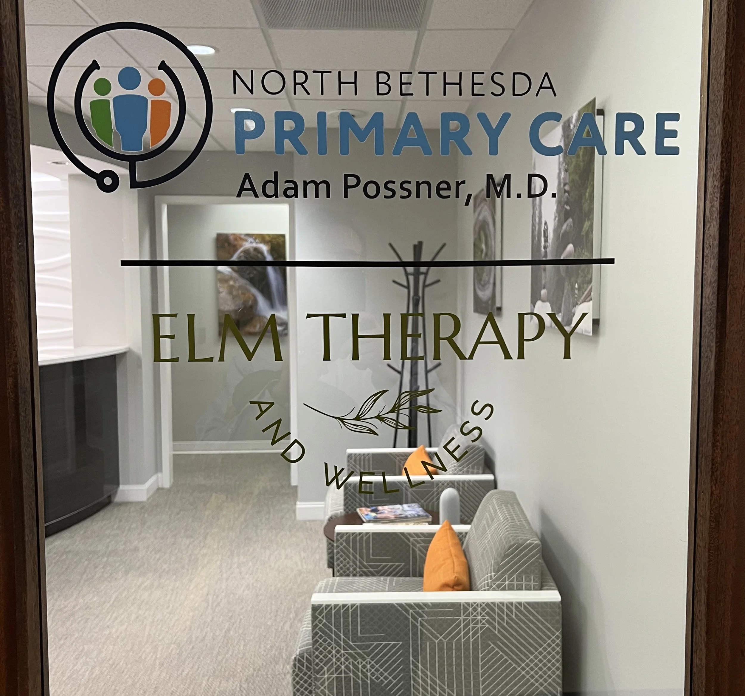 photo of door to office with logos of elm and north Bethesda primary care