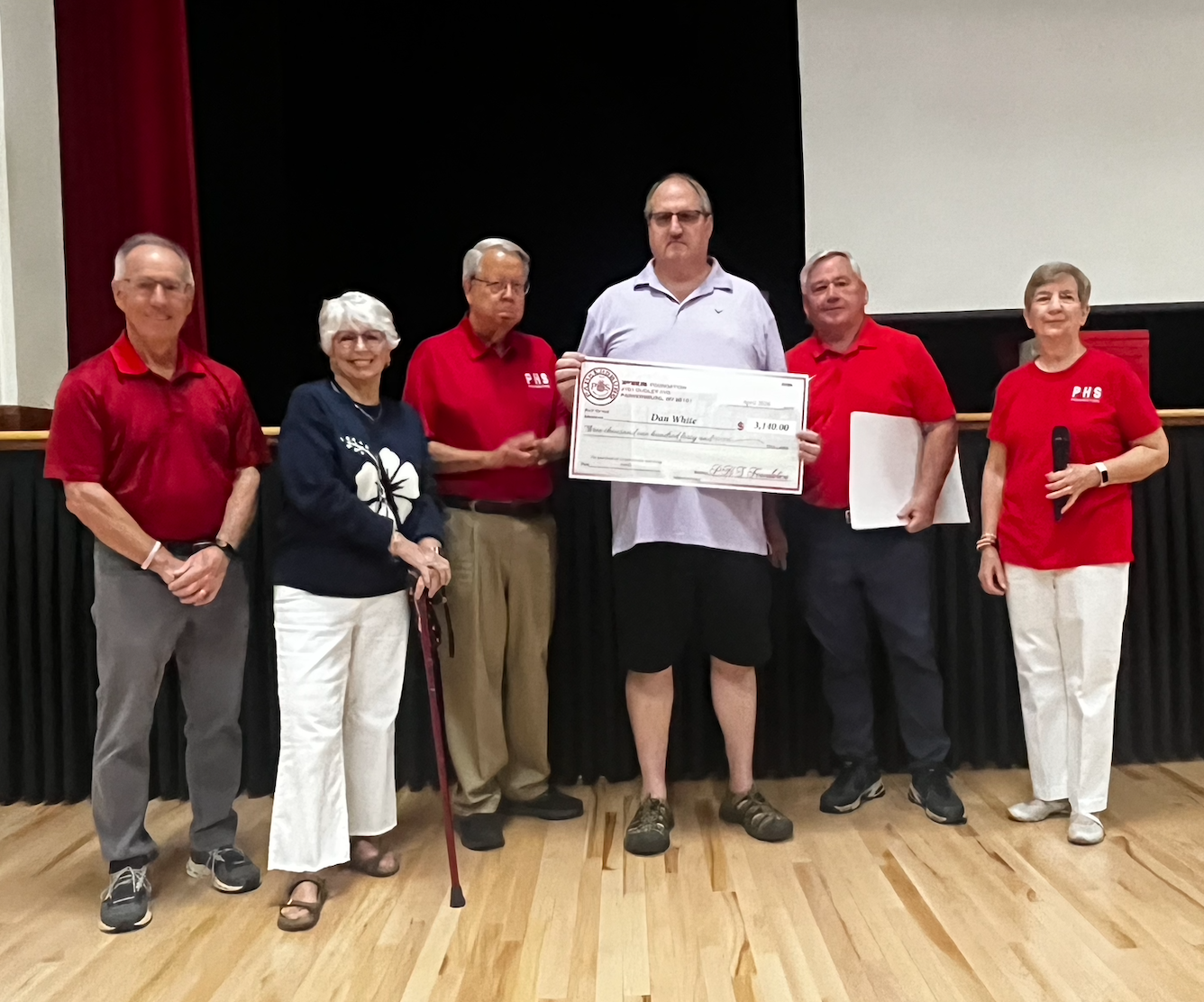Dan White will use the funds to purchase 12 percussion marching stands.