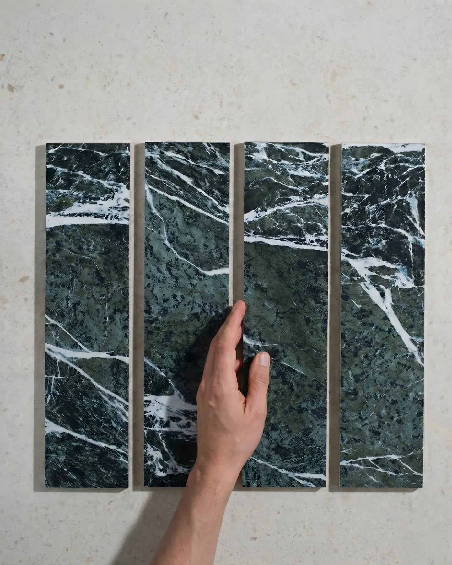 Verdi Alpi in its raw state and then cut down, laid out and ready to become something considered. 

Deep green, heavy veining, real presence. 

This is the stage where we slow it right down, study the movement in the stone and decide how each piece s