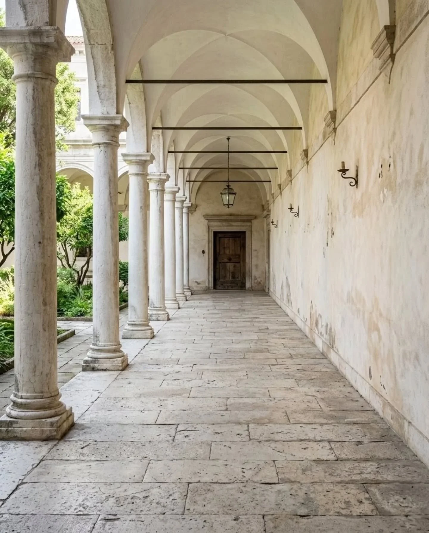 A quiet moment in the cloisters of San Giorgio Maggiore, Venice.

I didn&rsquo;t plan to stop, I rarely do but something about this corridor makes you slow down whether you want to or not. 

It&rsquo;s the rhythm of the columns and the weight in the 