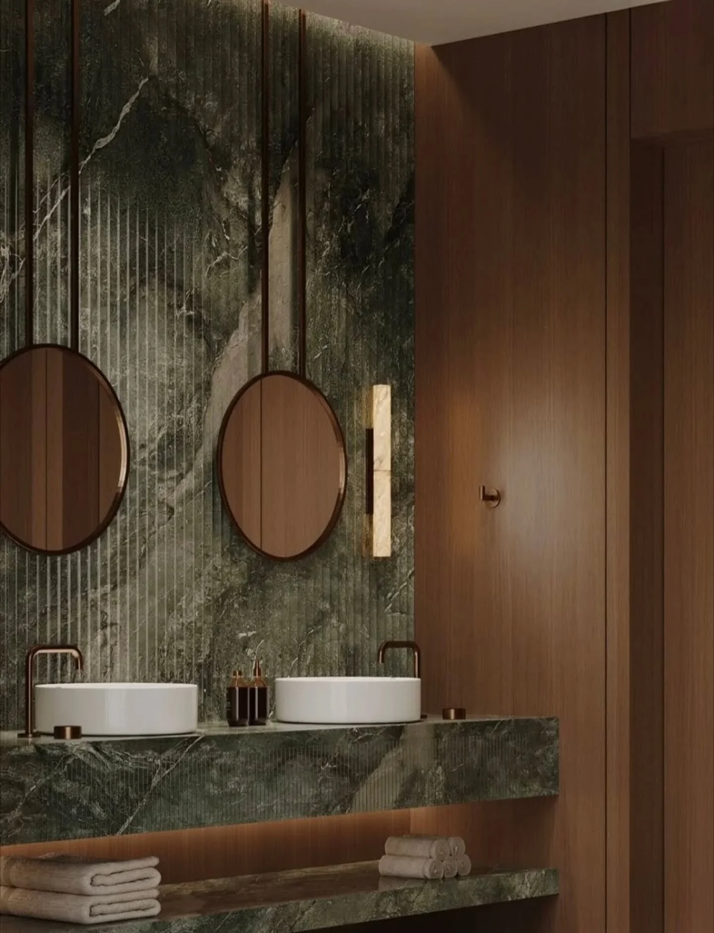 Most people come to us for a basin or a bath, but that&rsquo;s usually just the starting point.

Spaces like this are a good reference for how far marble can be pushed when it&rsquo;s used properly.

The fluted wall changes everything, it breaks up t