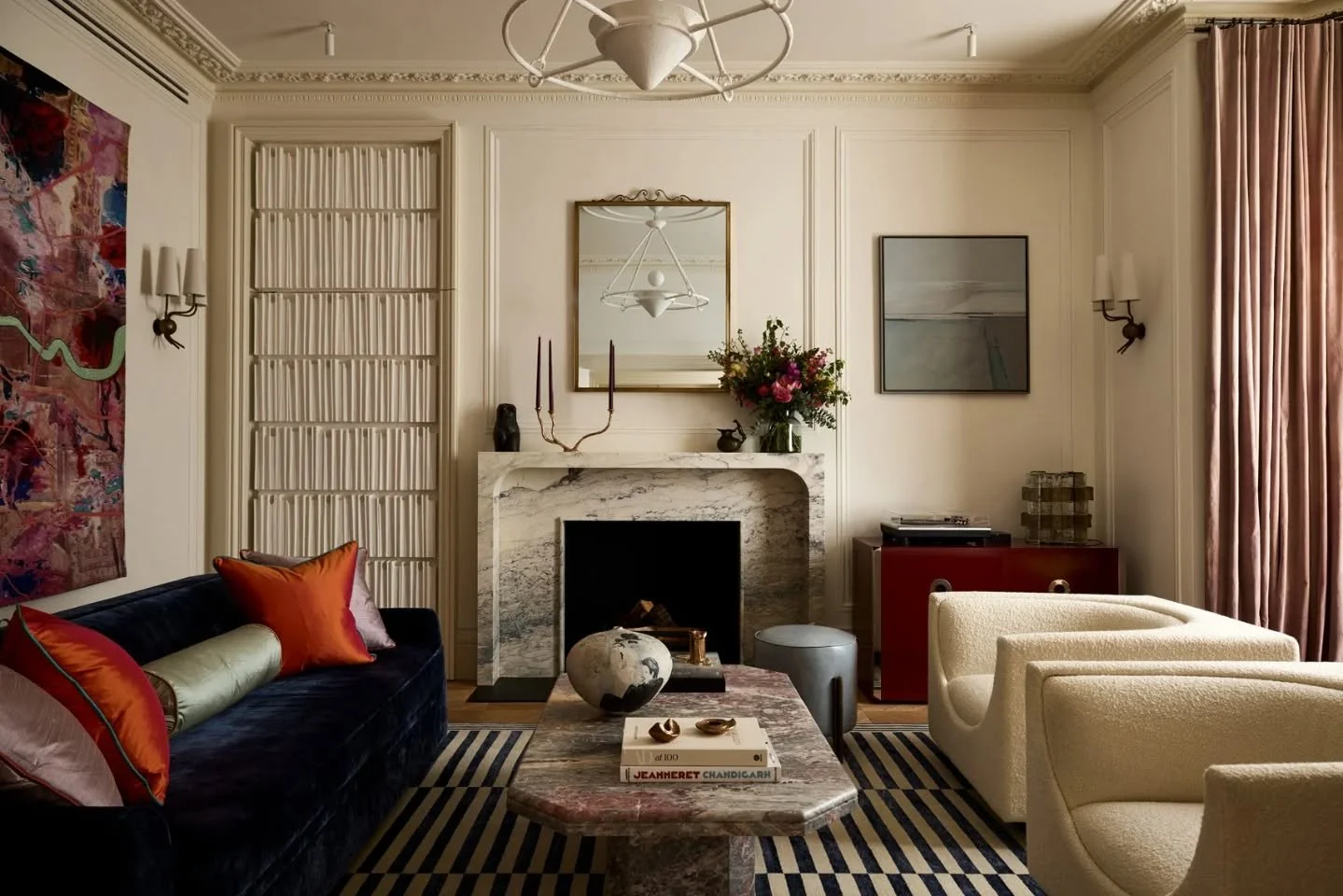 People spend weeks picking colours and fabrics, then the whole room ends up being carried by one element anyway.

In this case it&rsquo;s the marble fireplace. It&rsquo;s not loud, but it&rsquo;s doing all the heavy lifting, grounding the space, givi