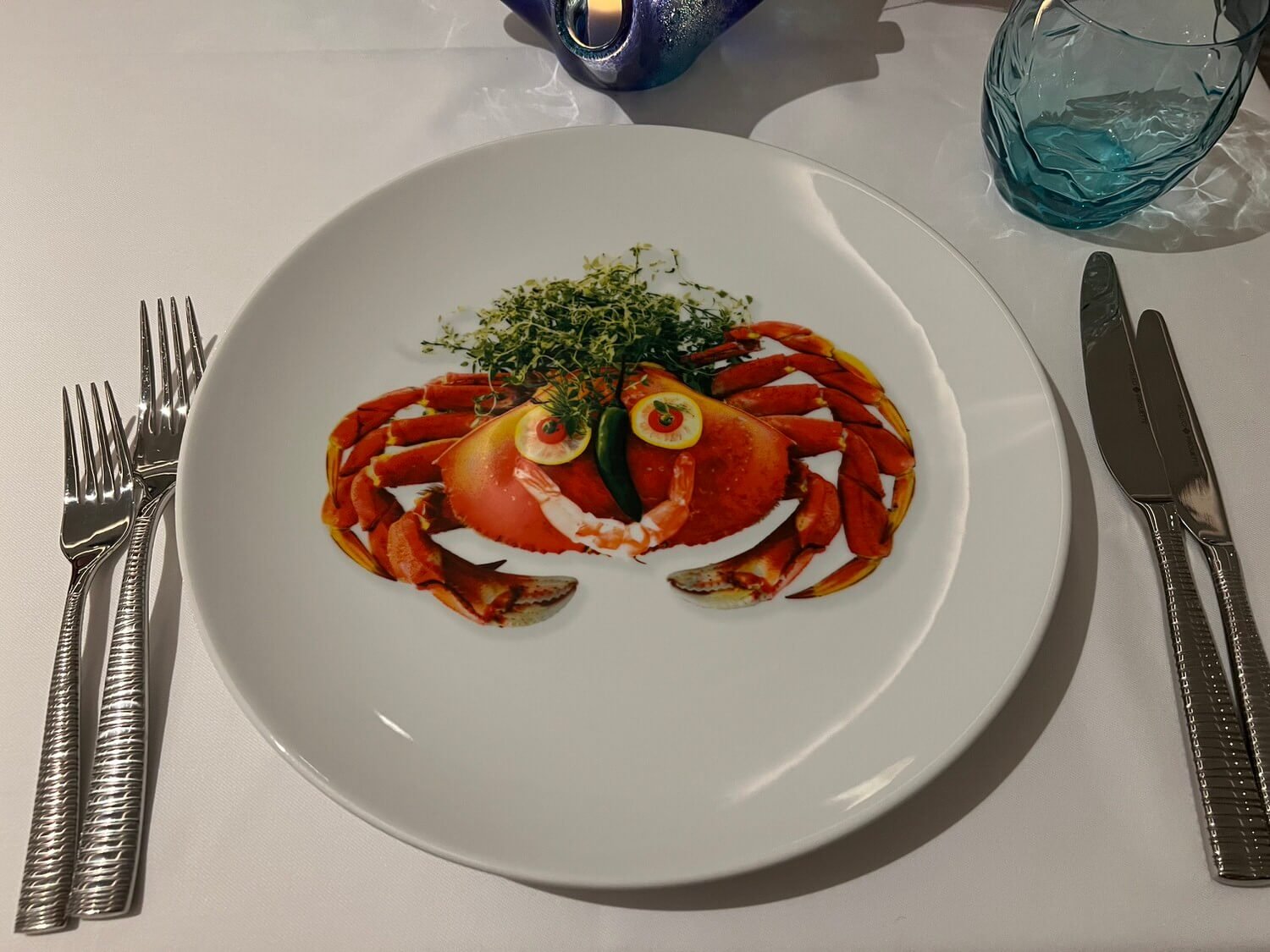 rudis-seagrill-crab-face-plate.jpeg