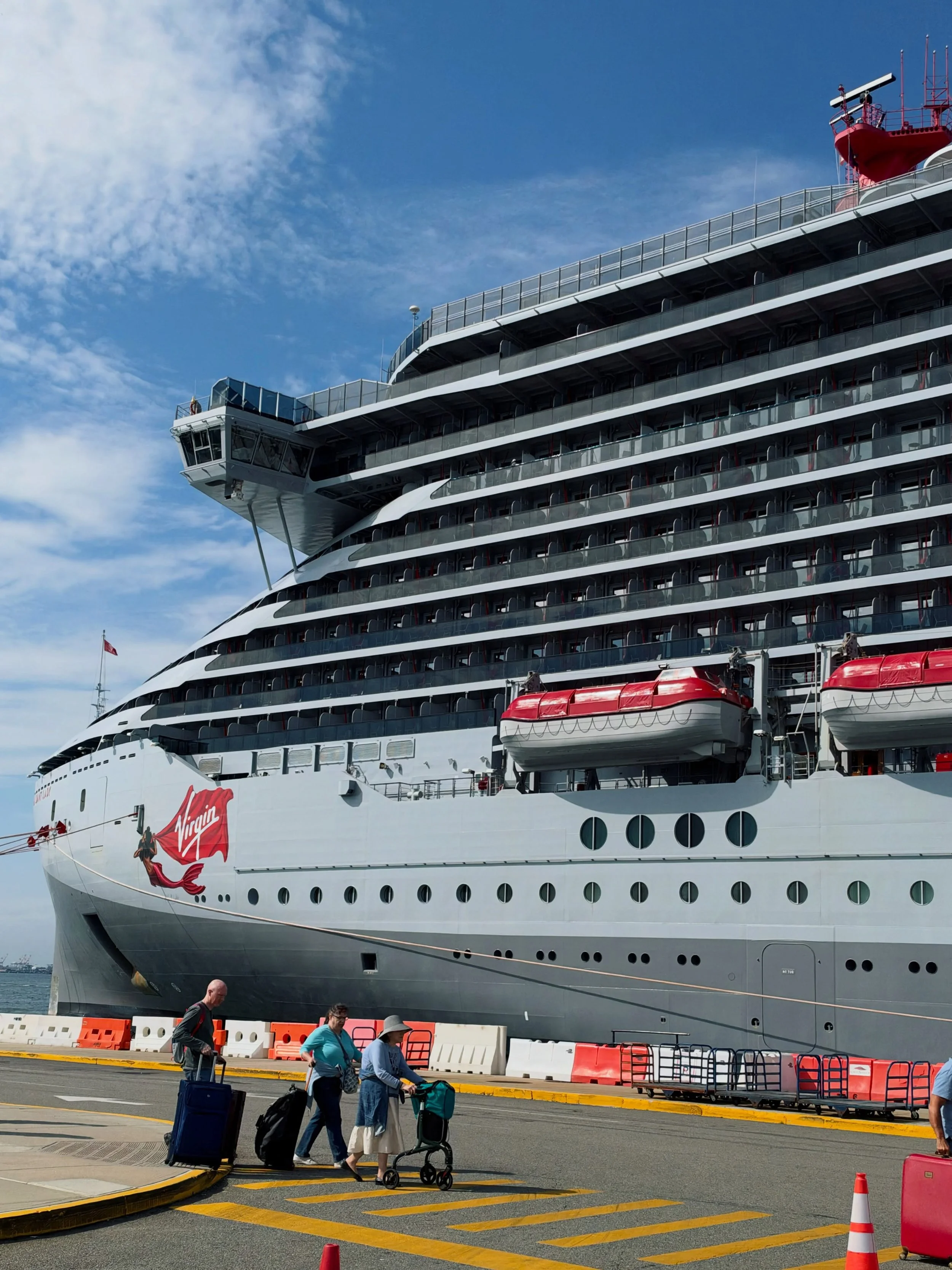 Getting from our hotel in Manhattan to the Brooklyn Cruise Terminal was a breeze! We dropped off our luggage, checked in, and quickly found seats in the terminal to wait for boarding. 🚢⚓️

Shortly after 1:45 PM, they called Deep Blue Extras and Spla