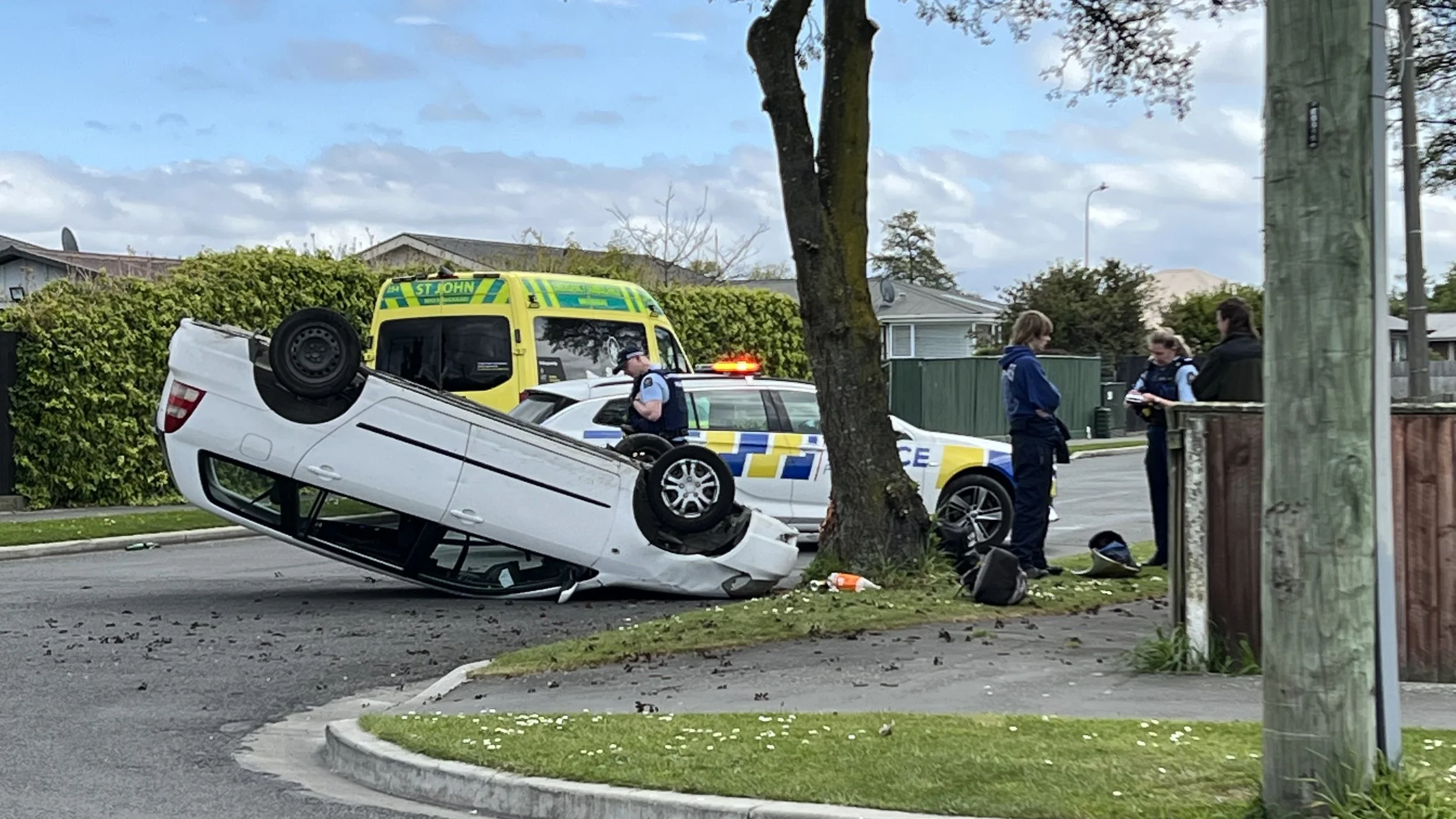 Car flips upside down in Woolston after hitting tree - Chris Lynch Media