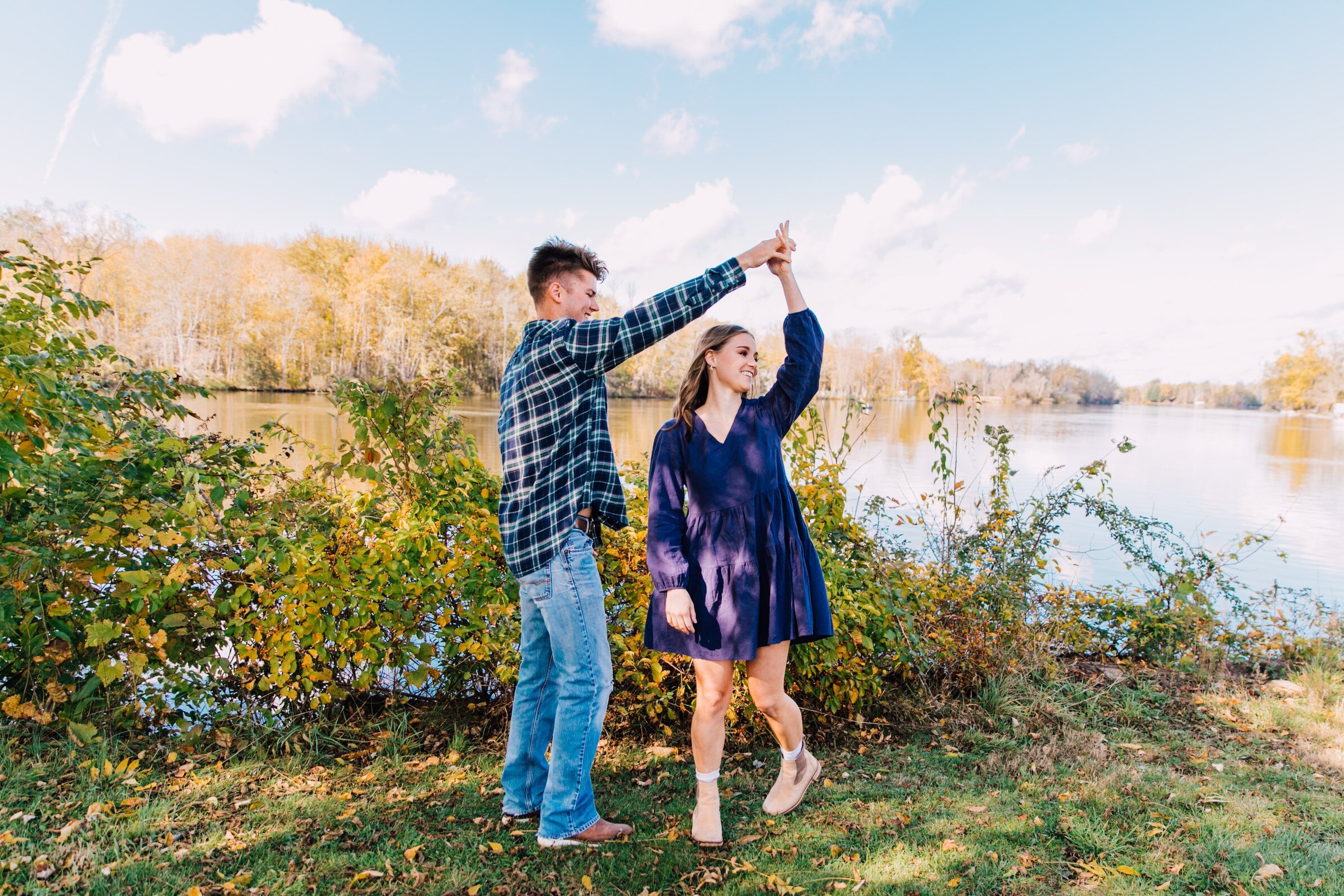  engaged couple dance during a fall mini session 
