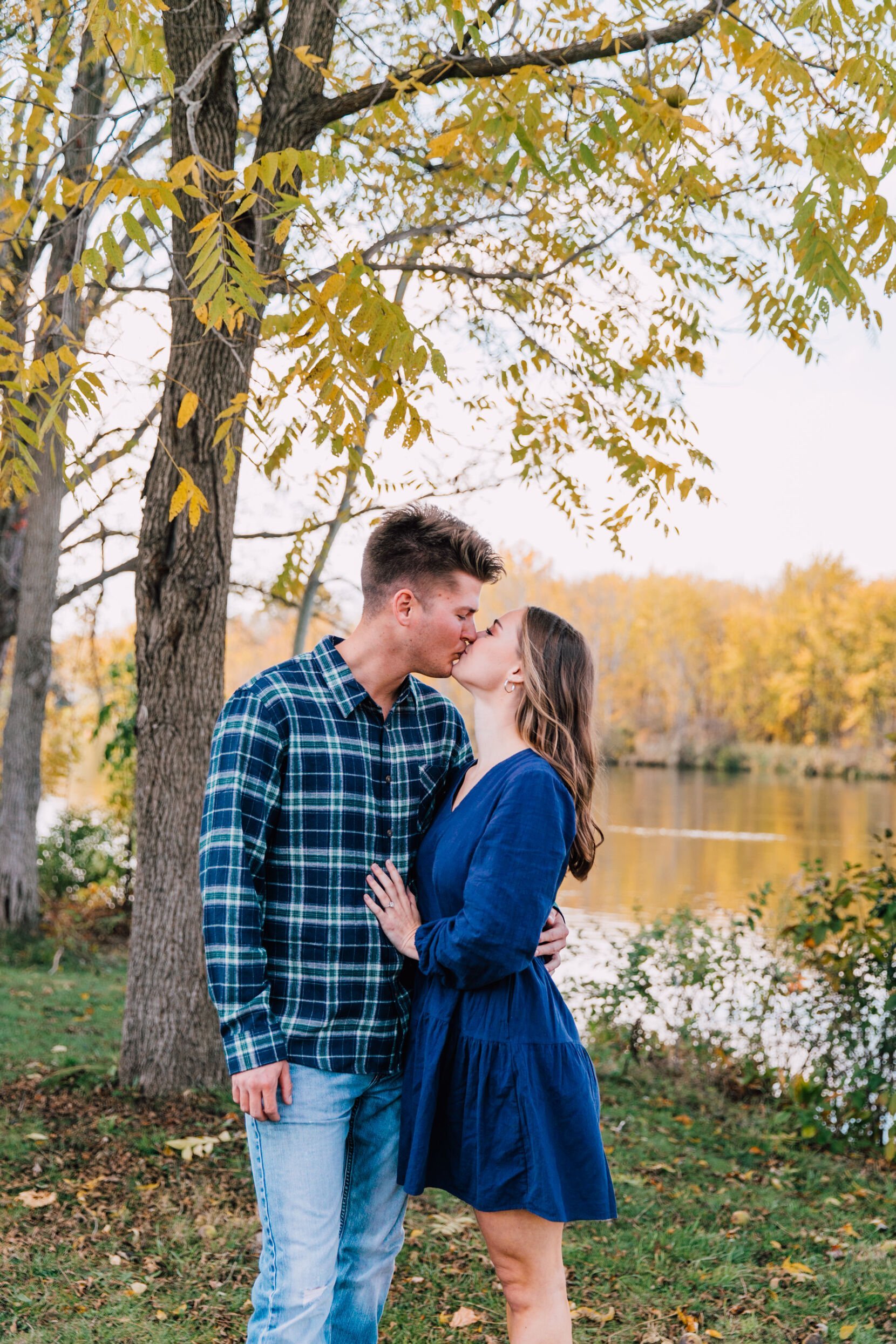  engaged couple kiss during a mini session  