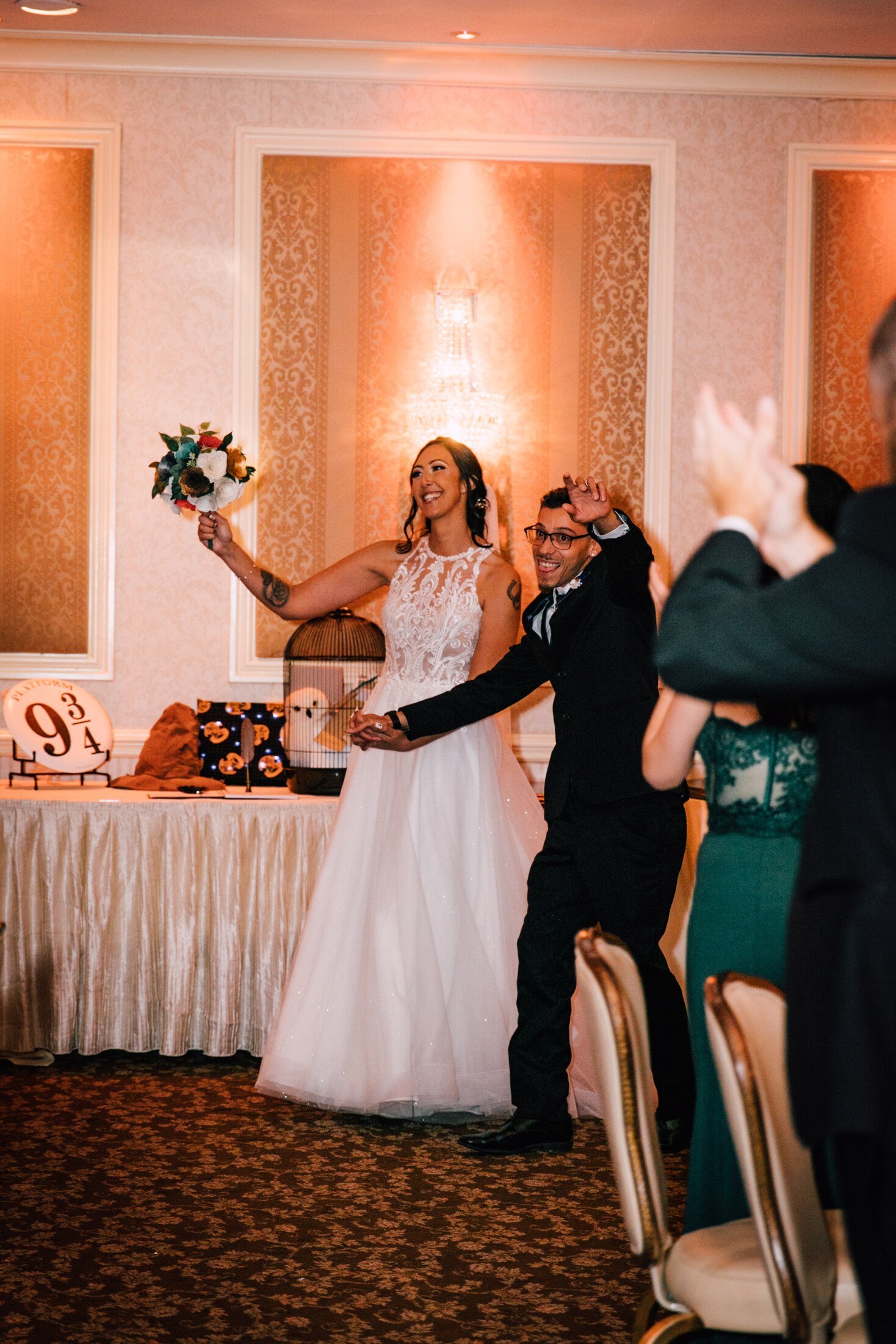  the newlyweds are announced at their harry potter wedding reception 