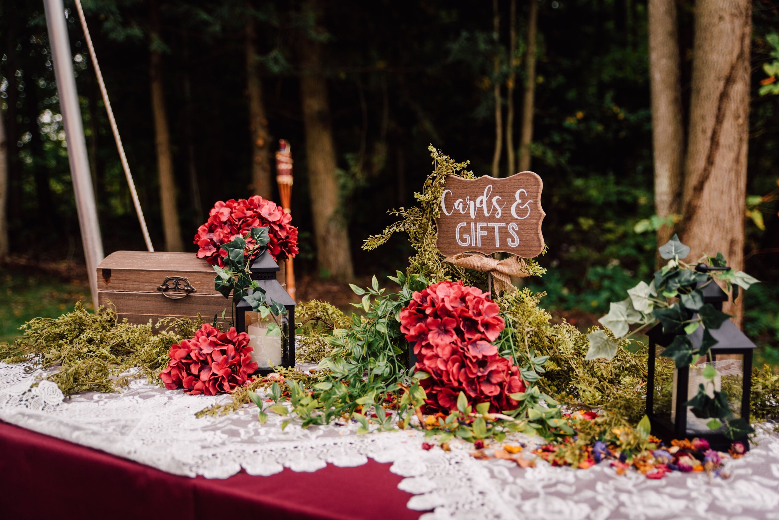  A cards and gifts table is decorated as part of the backyard wedding decor 