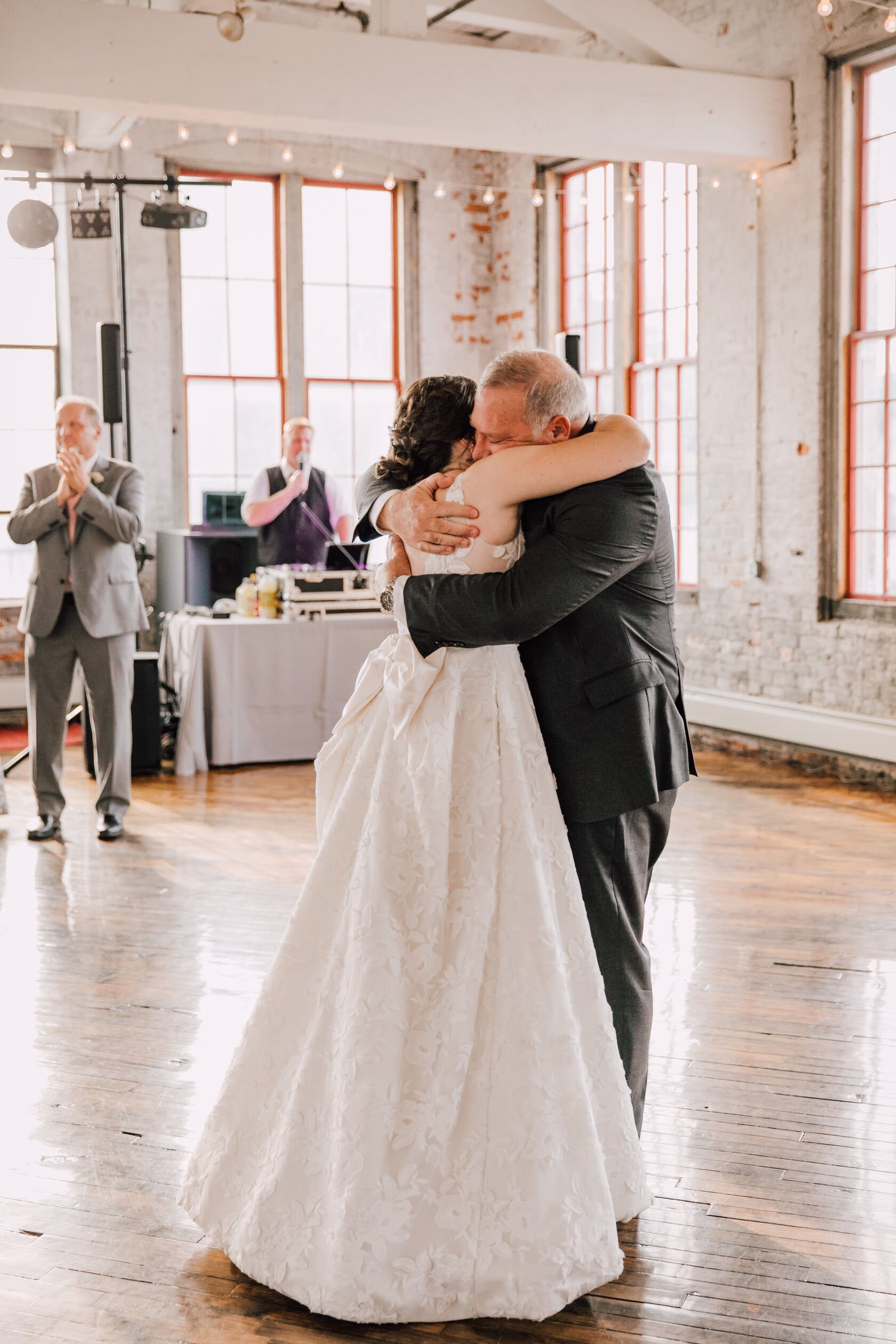  the bride and her father share an emotional dance at her vow renewal 