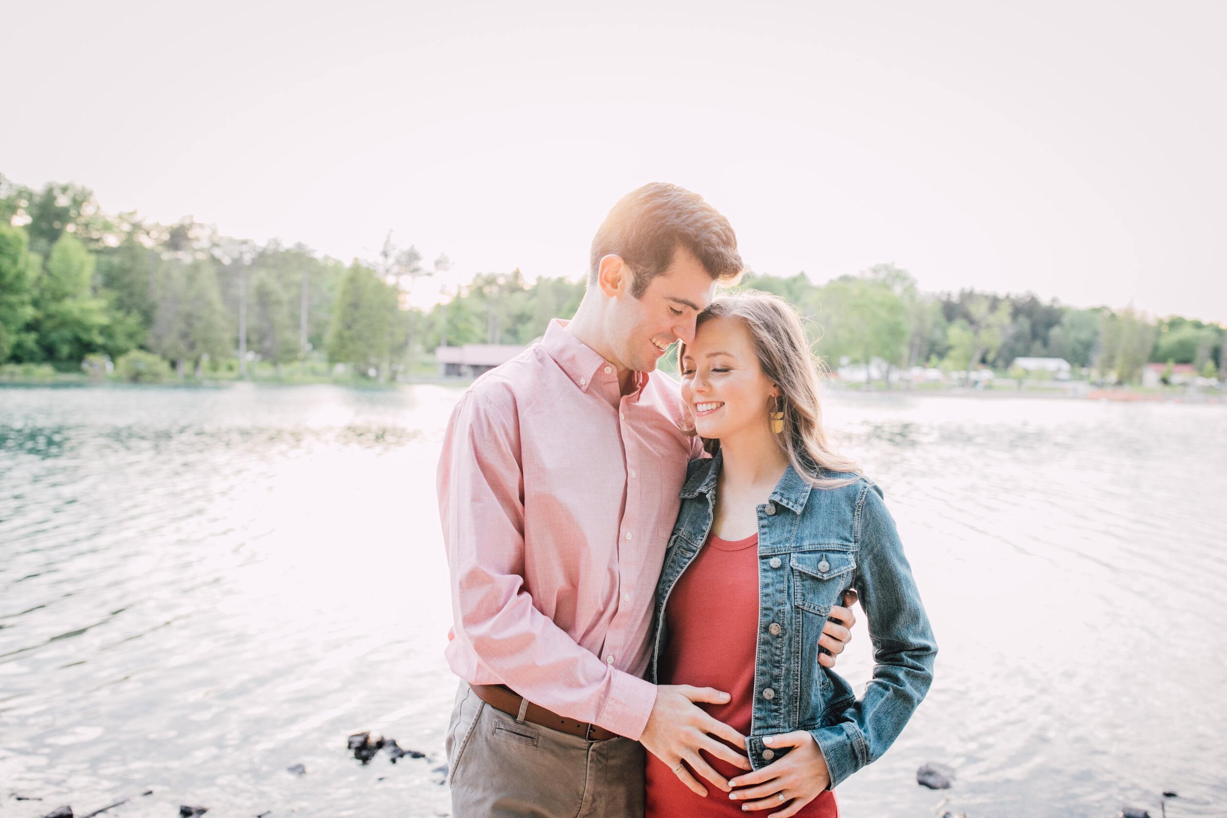  Parents to be smile together during pregnancy announcement photos 