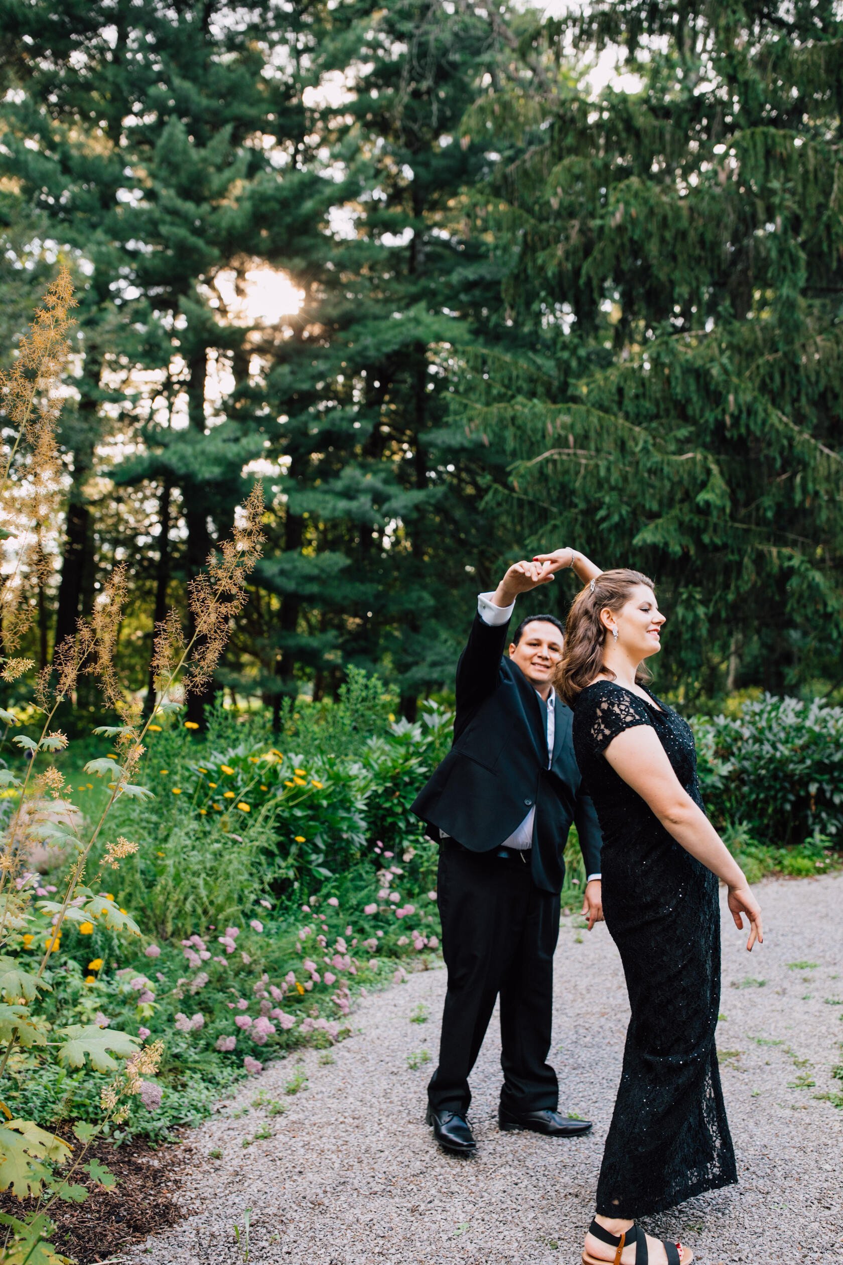  kevin twirls elizabeth during a photoshoot to celebrate their anniversary in Cazenovia, NY 