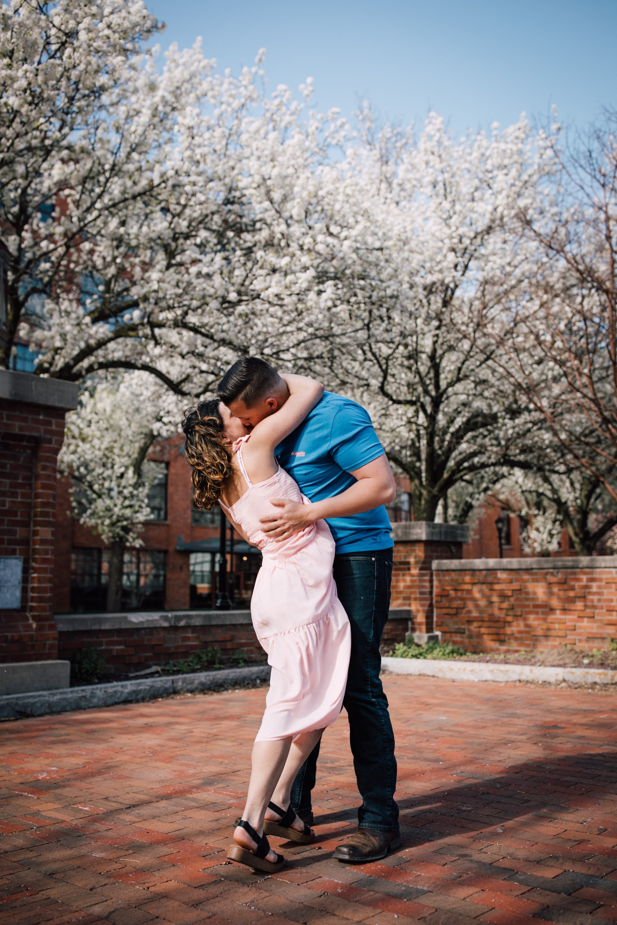  couple kisses during engagement session in downtown syracuse 