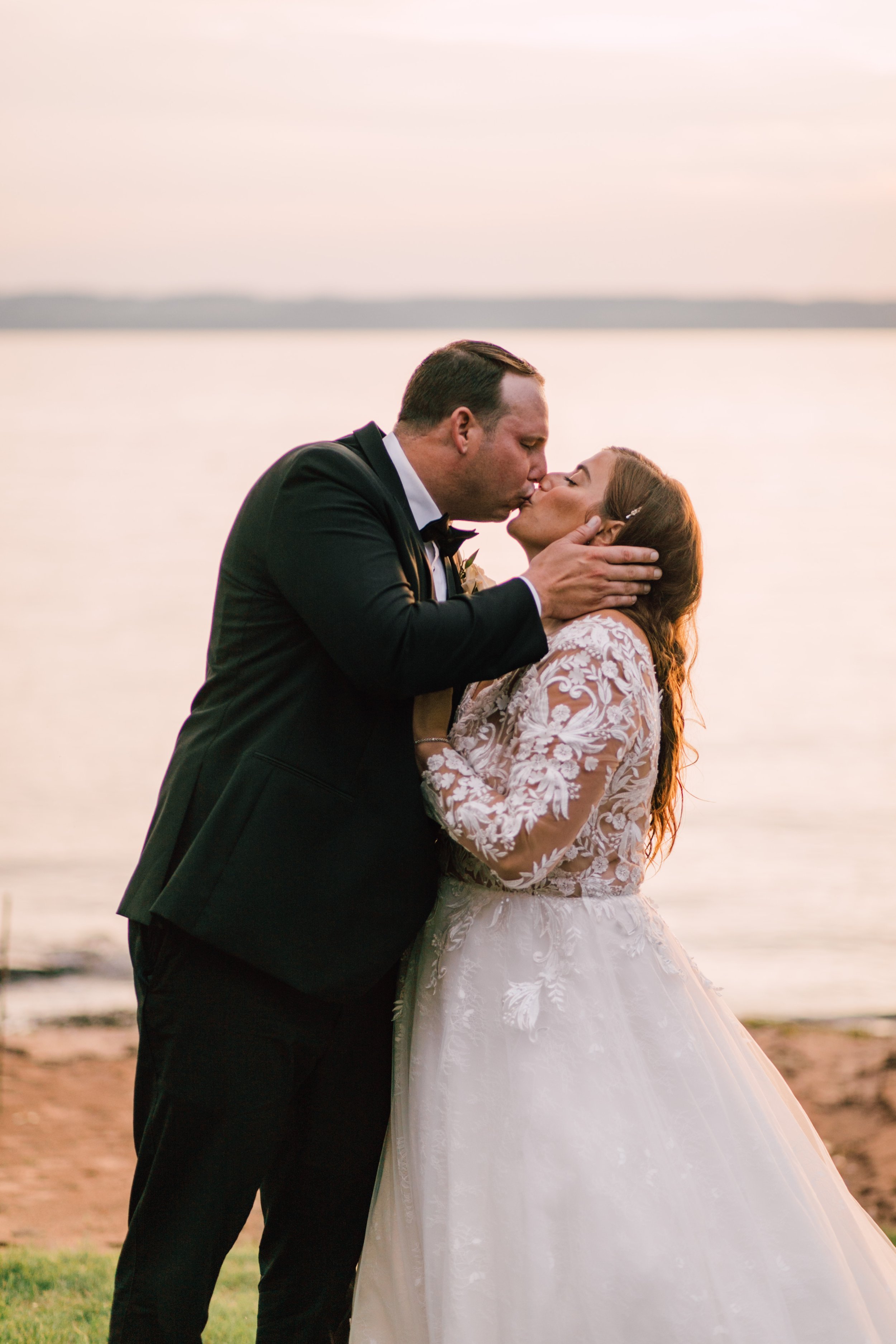  finger lakes wedding photographer captures bride and groom at sunset 