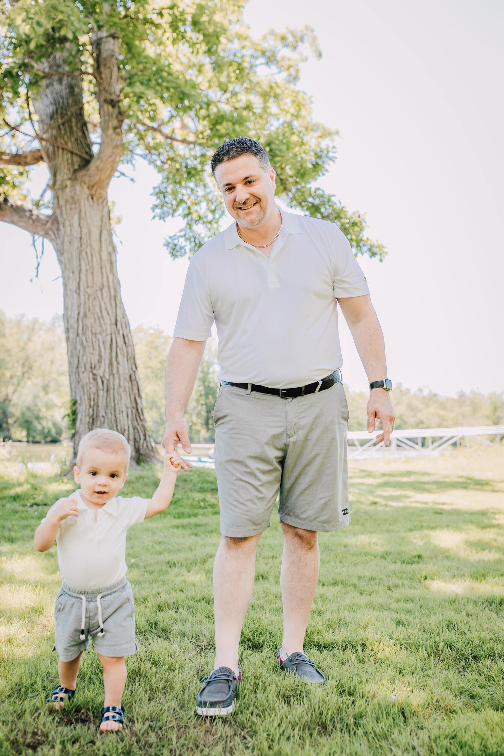 Syracuse family photographer captures father walking with his son 