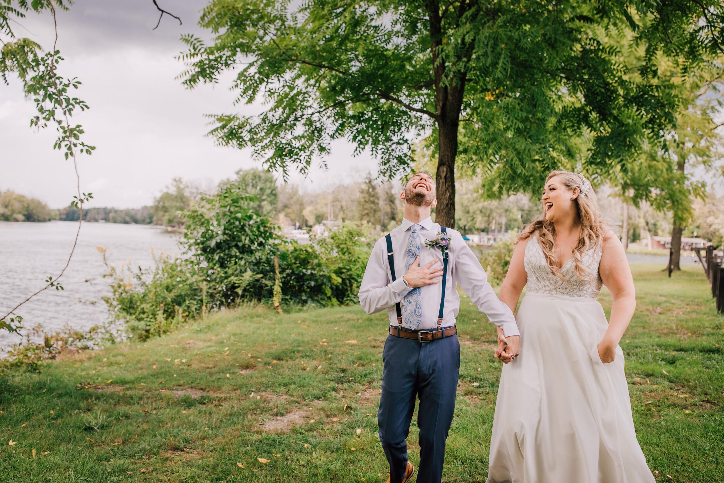  Bride and groom laugh together at 3 rivers park 