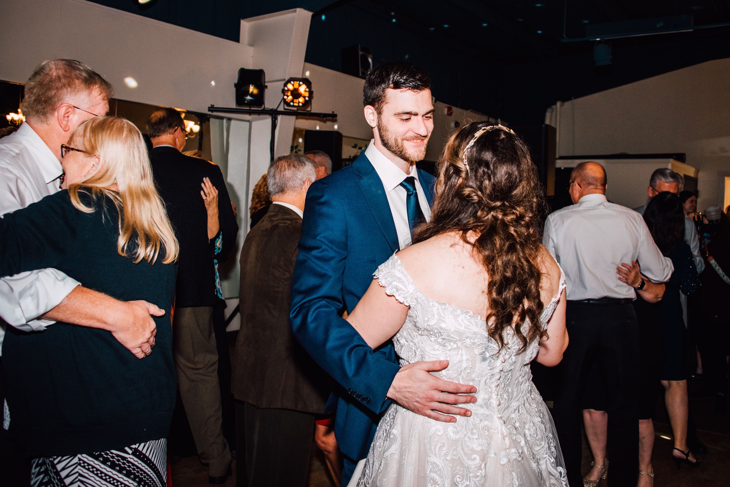  the bride and groom dance among their guests during their wedding reception at endwell greens 