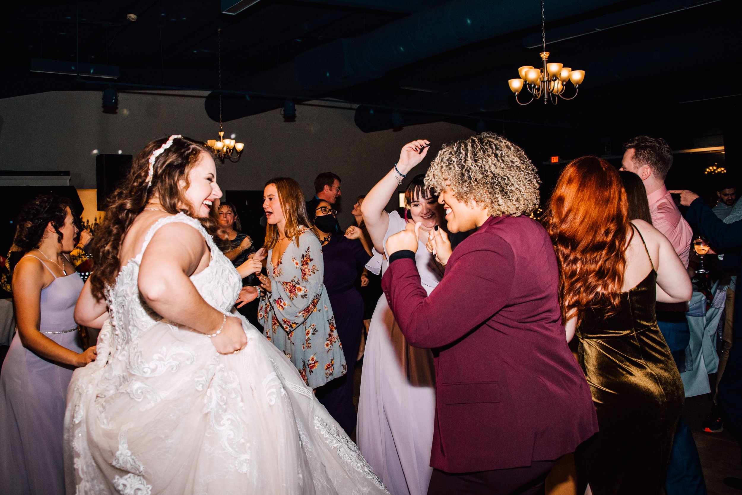  the bride dances with her friends during her wedding reception at endwell greens in endwell, NY 