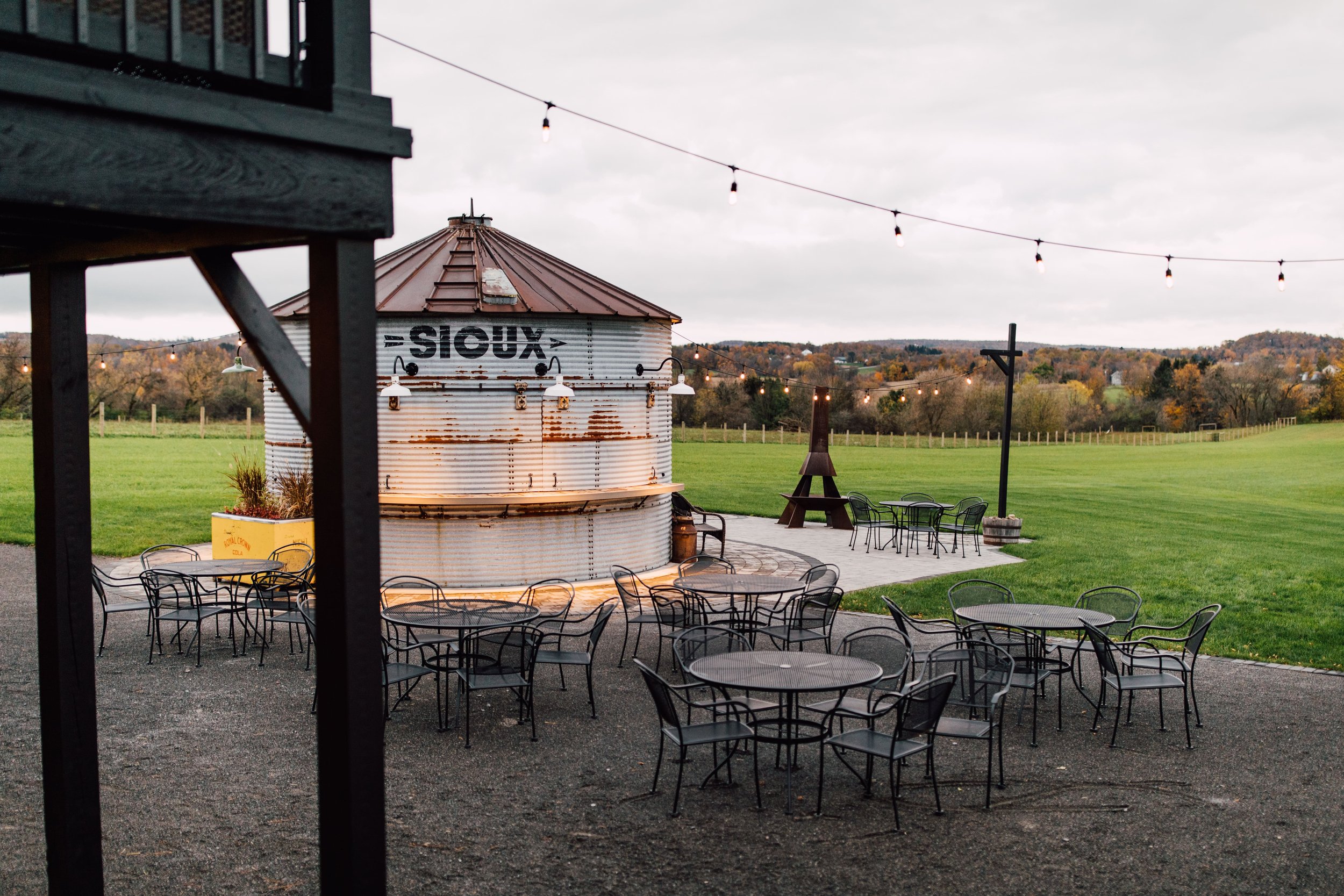  a portrait of the patio at hayloft on the arch 