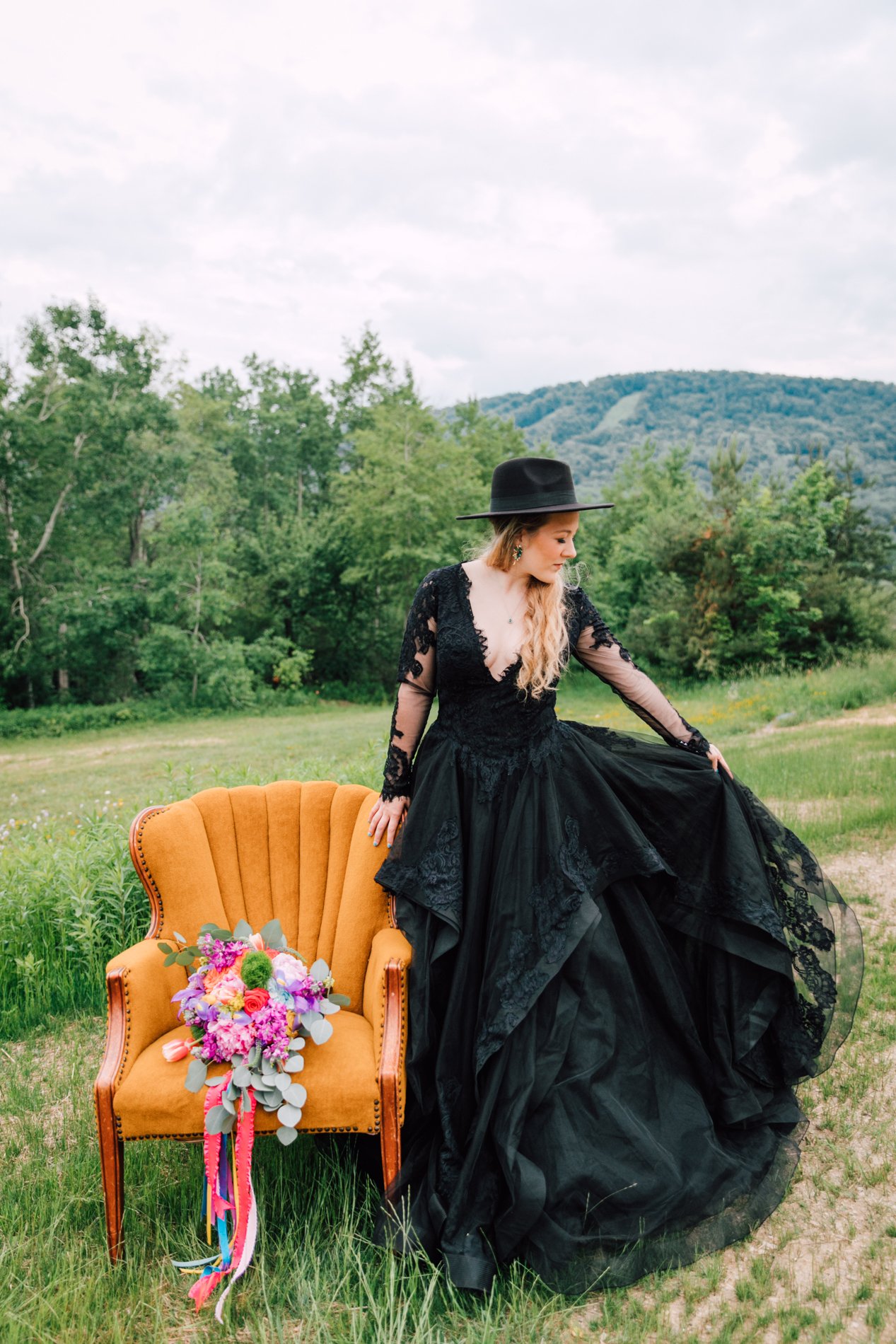  bride in black wedding dress and hat at Greek Peak styled shoot 