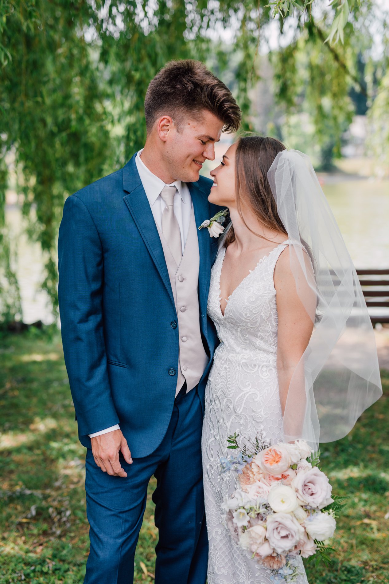  Bride and Groom embrace during traditional wedding in downtown Syracuse 