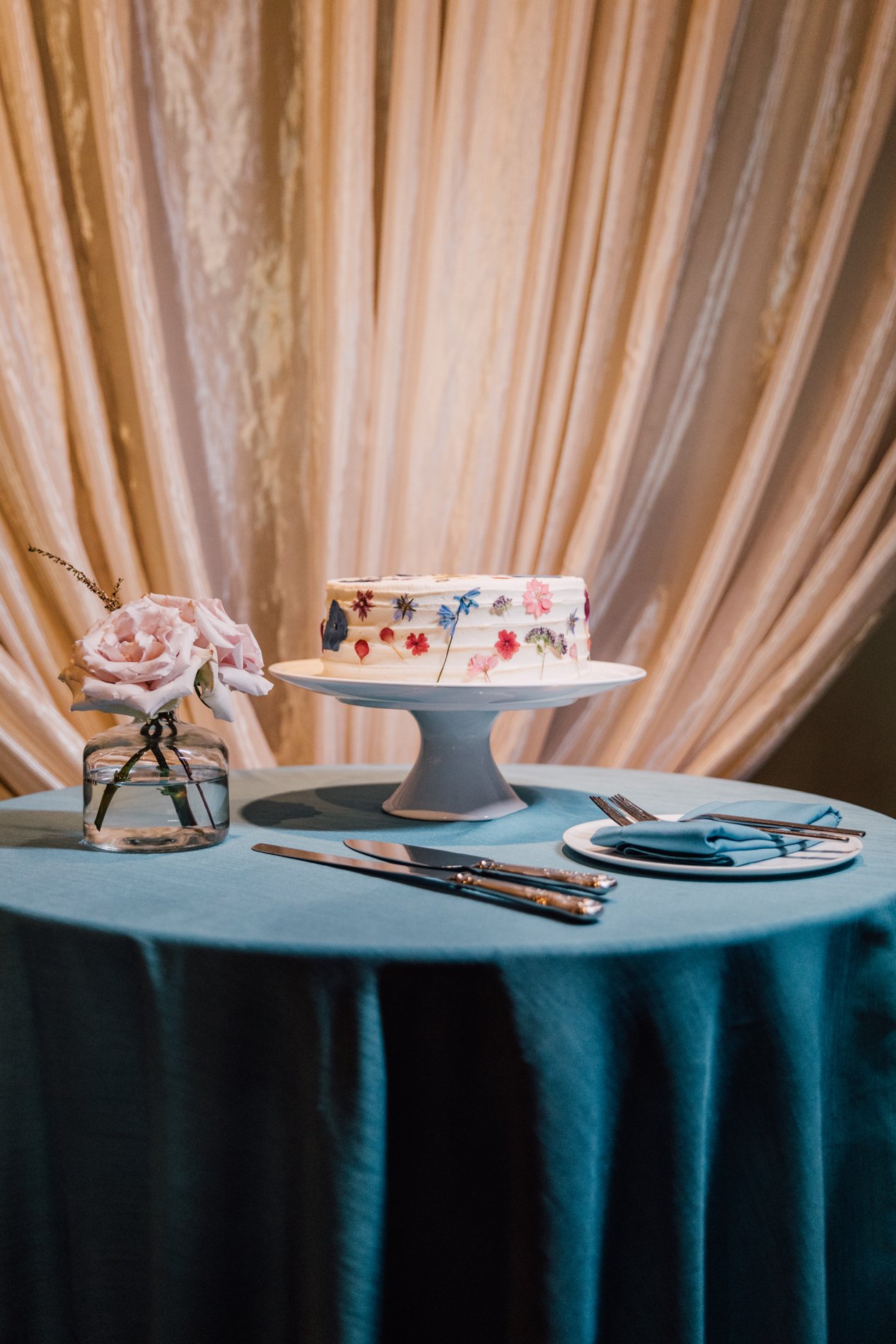  Small floral cake at Sky Armory wedding in downtown Syracuse 