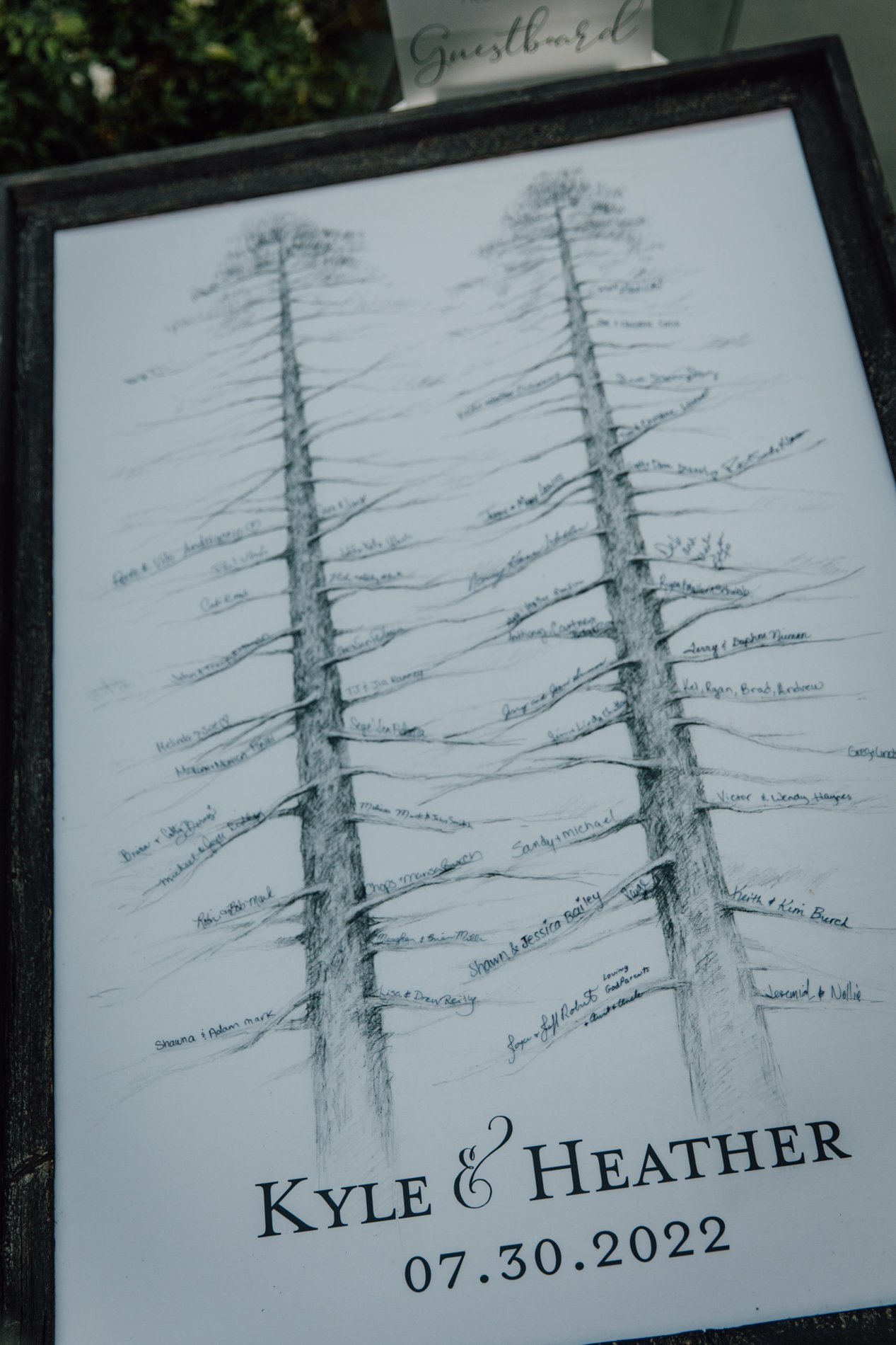  Custom guestbook with tree drawings at modern central NY wedding 