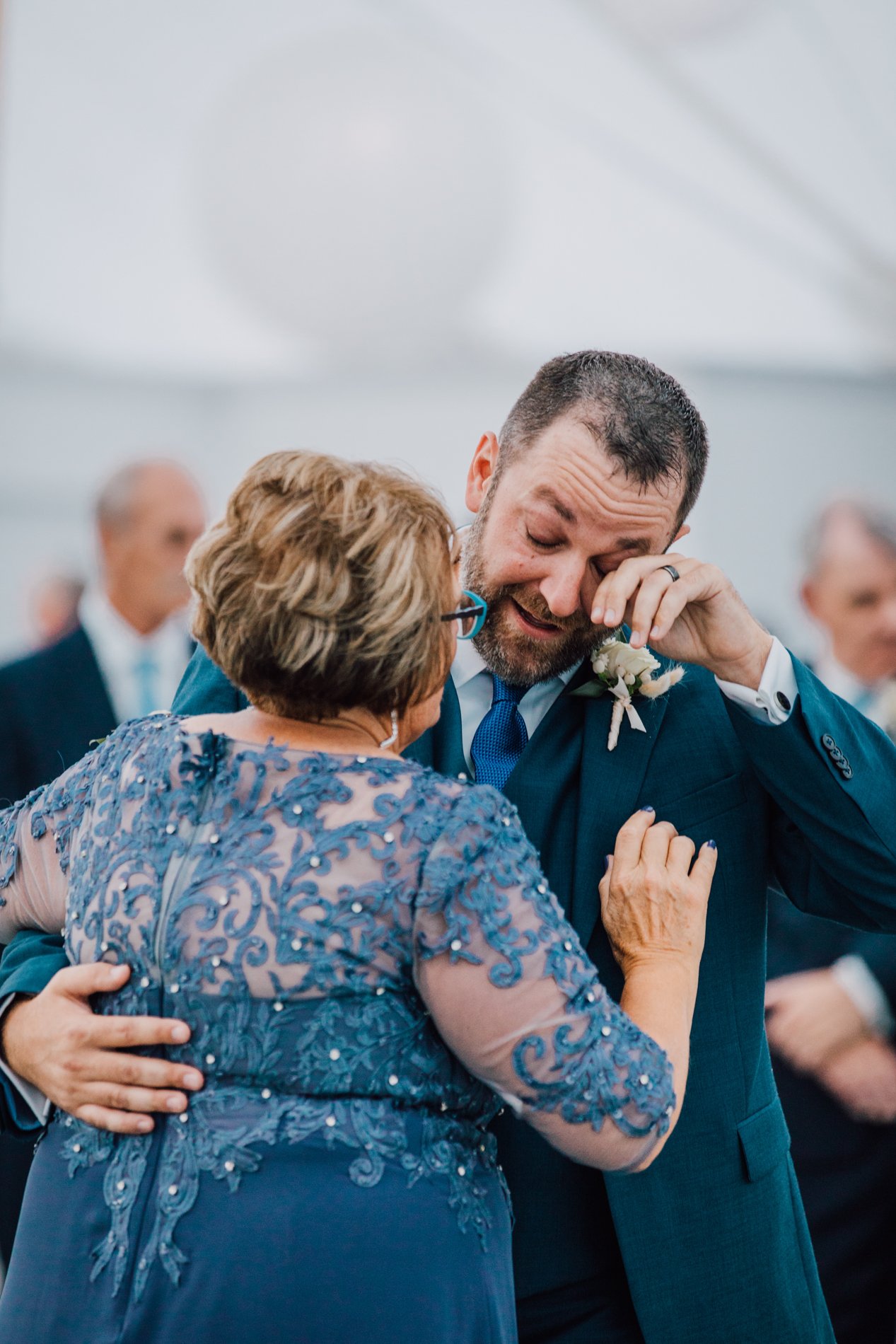  Groom cries during mother son dance at Taughannock Falls wedding reception 