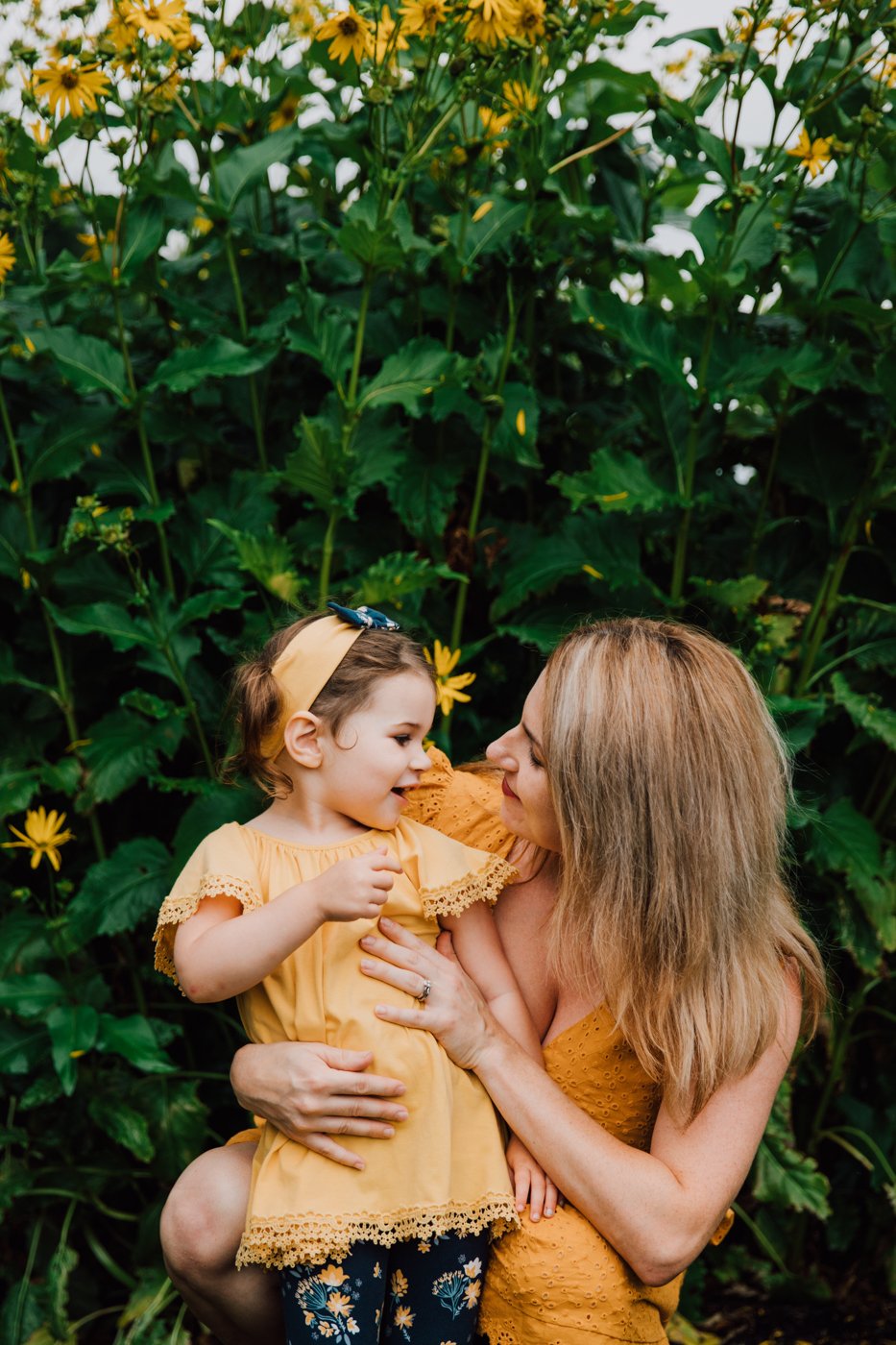  Mother and daughter during backyard family photos in Syracuse NY 
