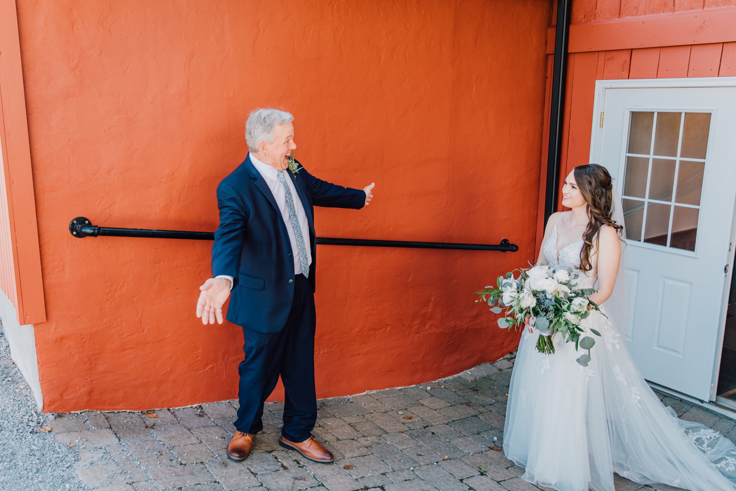 Father of the Bride is so excited to see his daughter for their father daughter first look at Hayloft on the Arch 