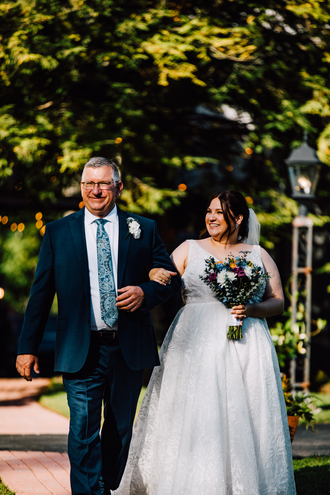  Bride walks down the aisle with her dad on a beautiful fall day at Sinclair of Skaneateles 