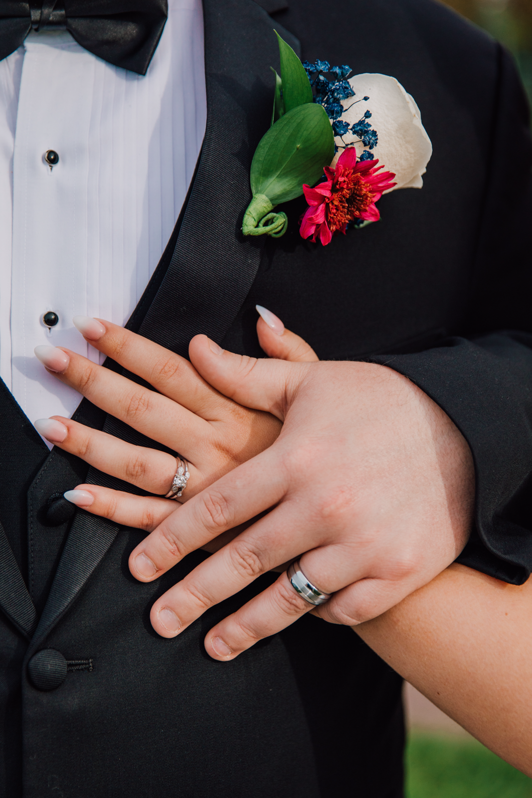  Bride and Groom’s hands show off their new wedding bands during Clayton NY wedding 