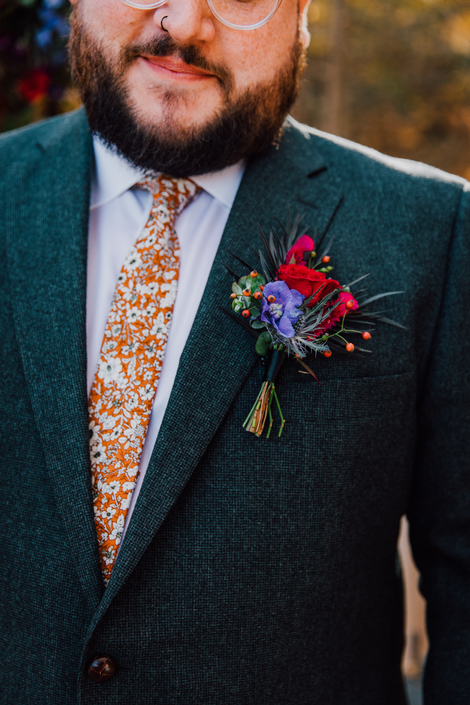  Close up of Groom’s tie and boutonniere for a moody fall wedding in Ithaca NY 