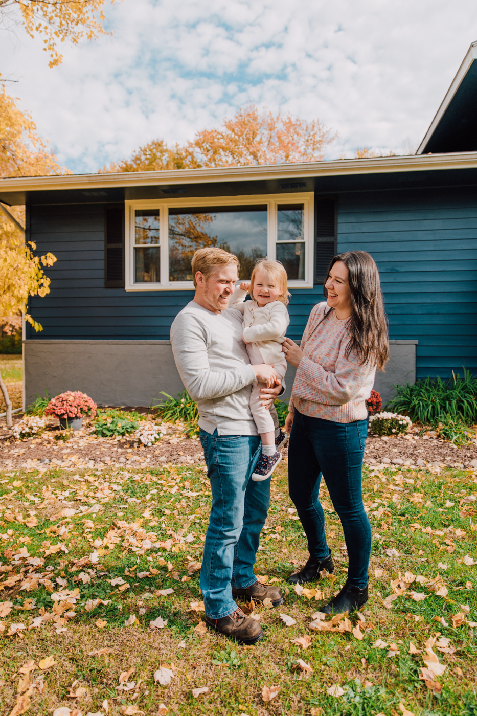  Young family smiles and laughs during their photoshoot at home in Central NY 