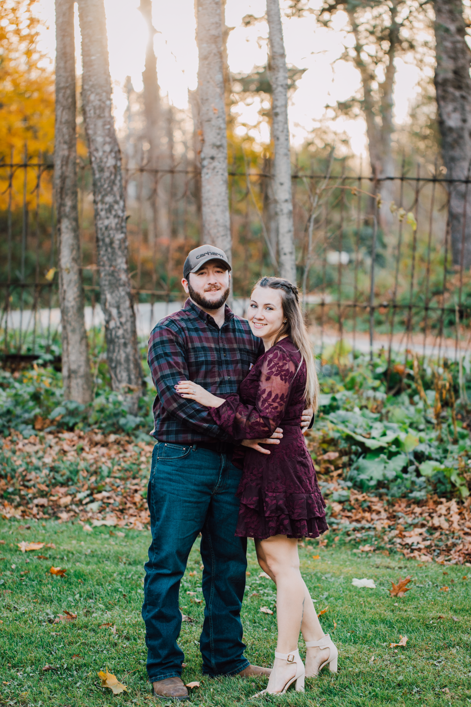  Engaged couple poses during their forest engagement photos at Delphi Falls county park 