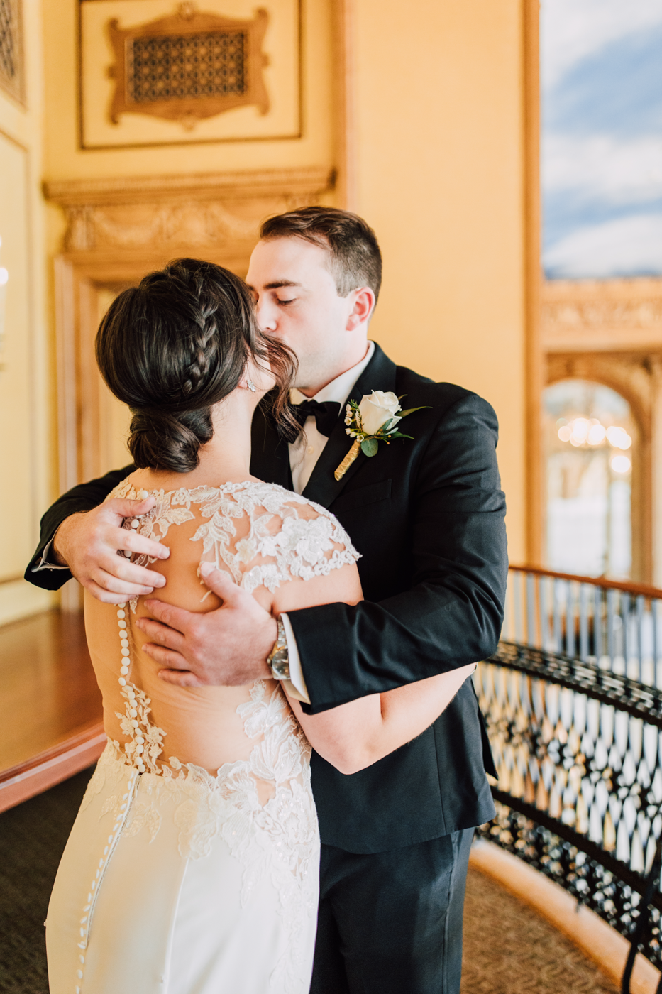  Bride and Groom kiss right after seeing each other for the first time at their wedding first look 