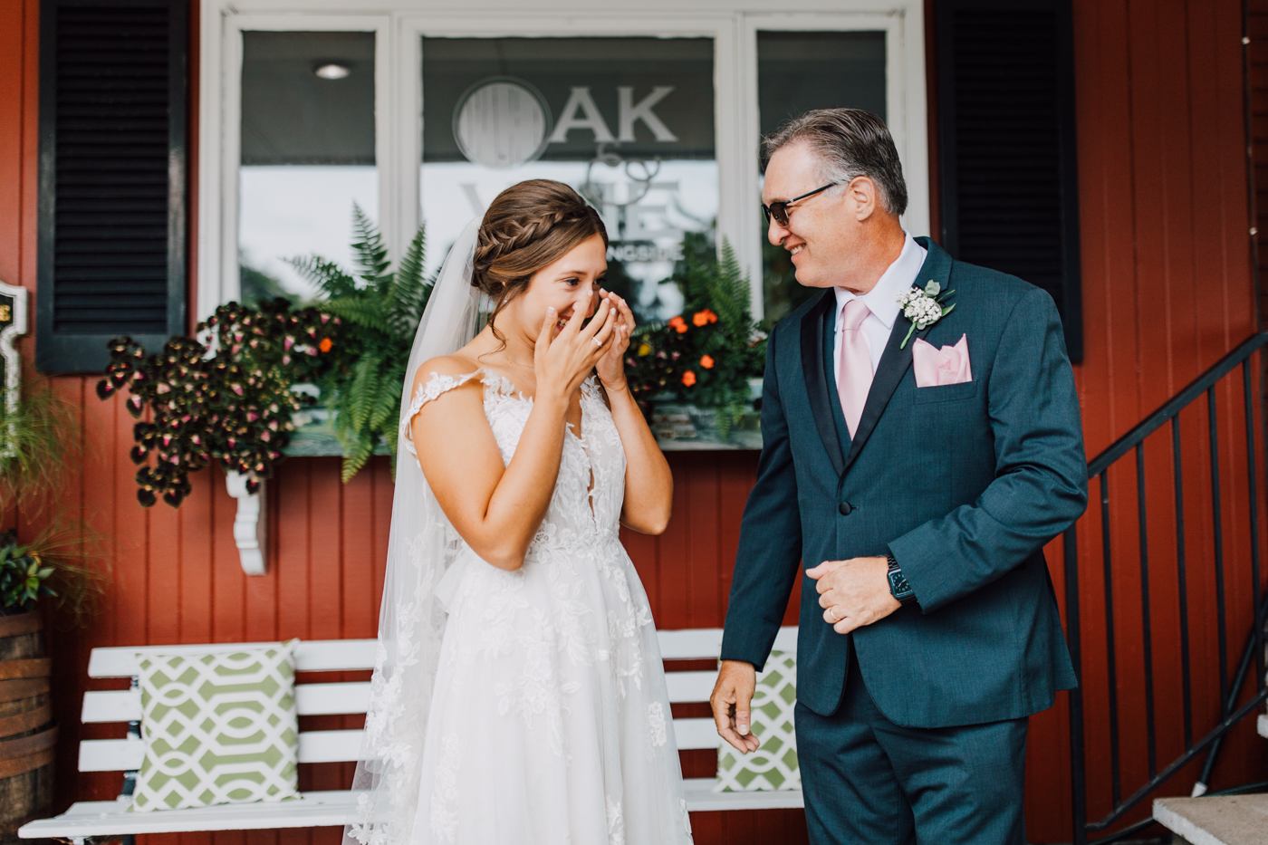  Bride tears up after doing a father-daughter first look before her traditional wedding at a church in Marcellus NY 