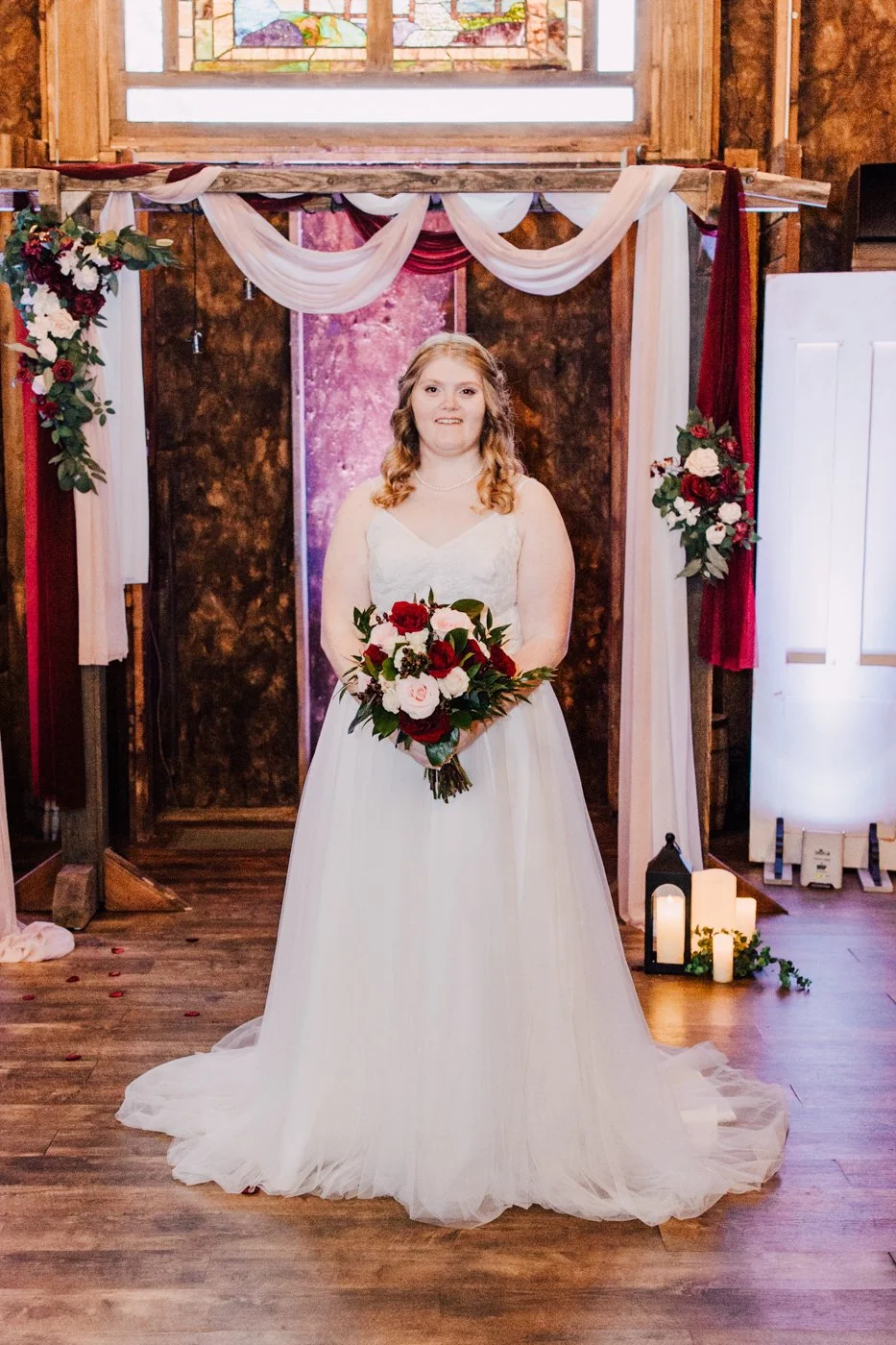  Bride poses for indoor wedding photos at Curtis Manor in Central NY 