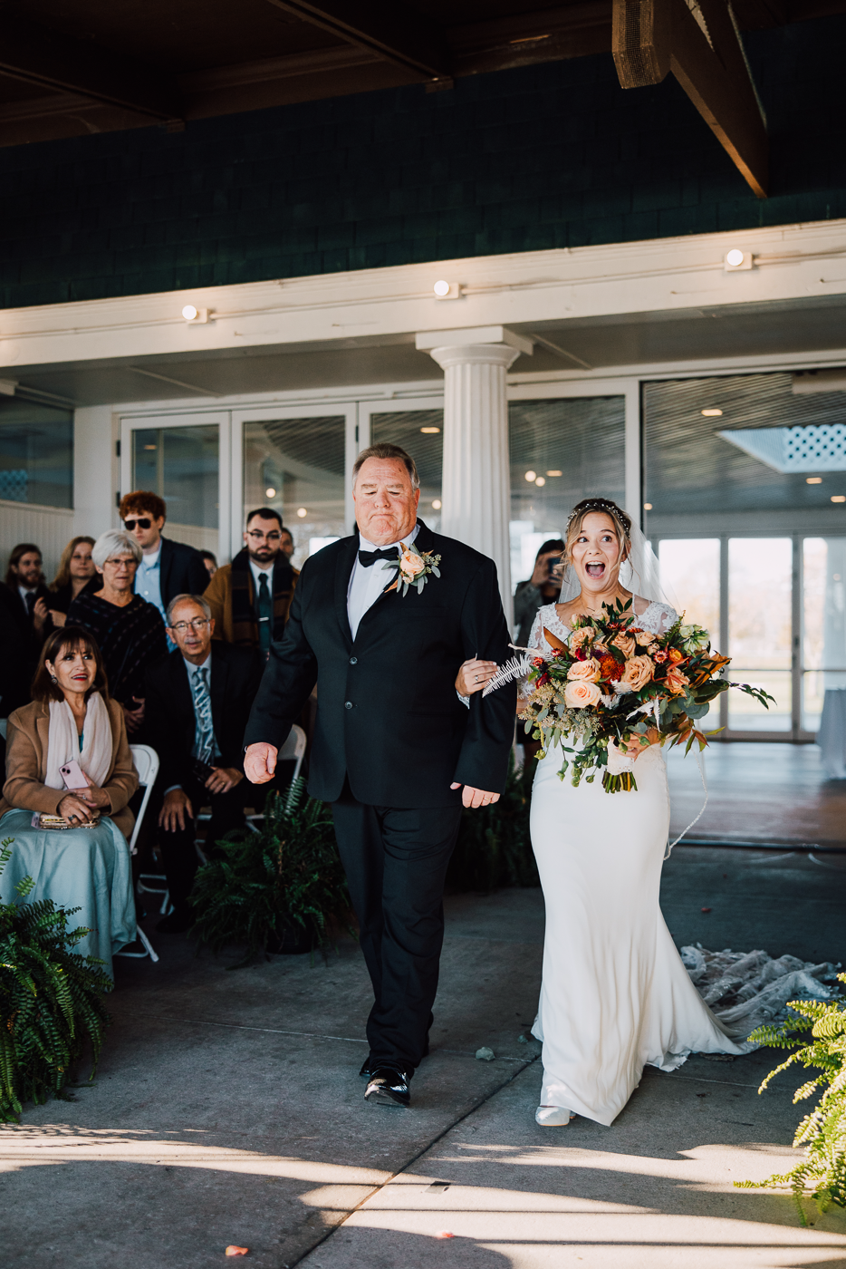  Bride is excited to walk down the aisle during her November wedding 