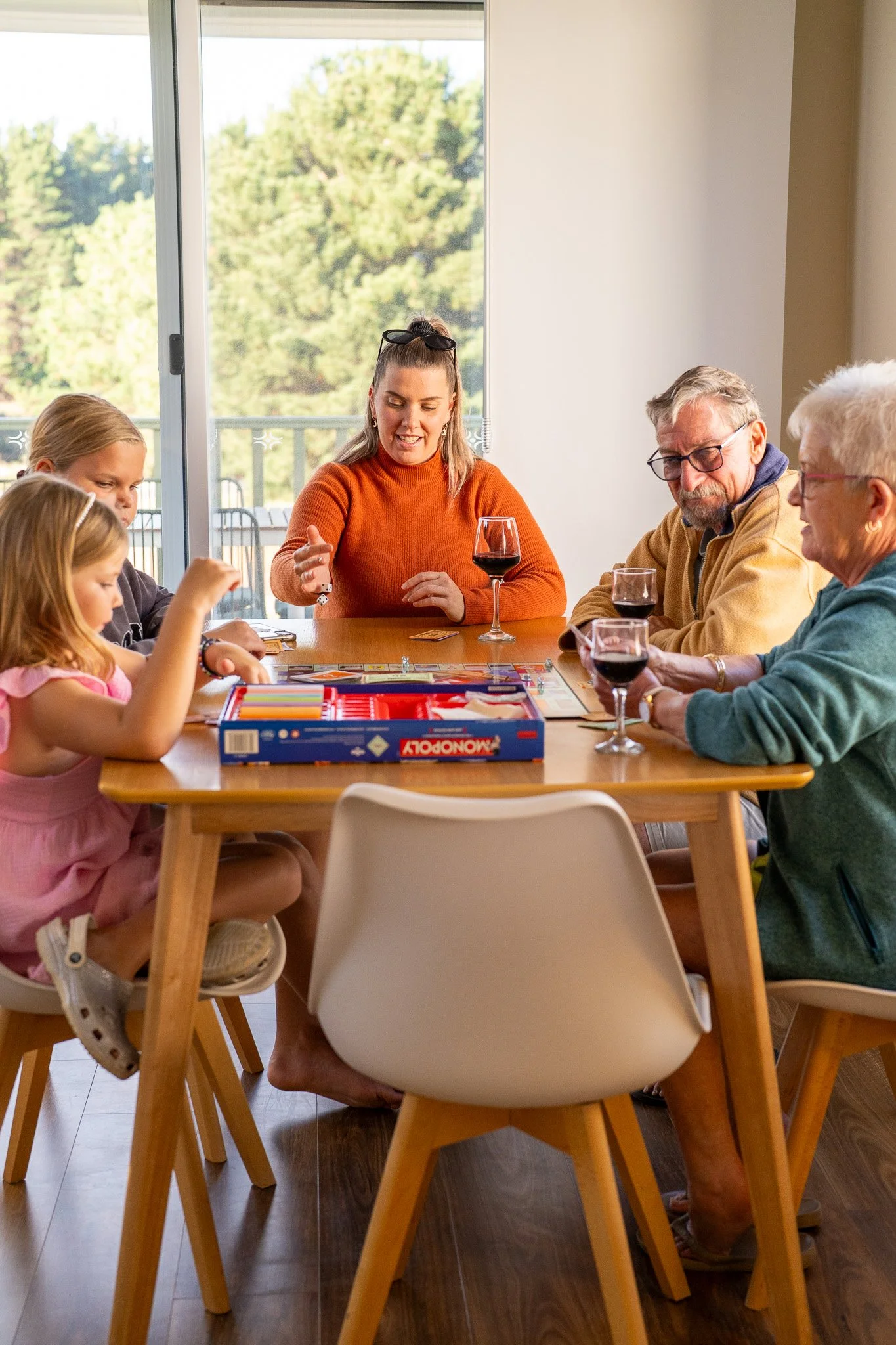 Family Games at the Table - Deluxe Two Bedroom Cabin