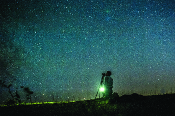  Under the stars, David captures a long exposure. 