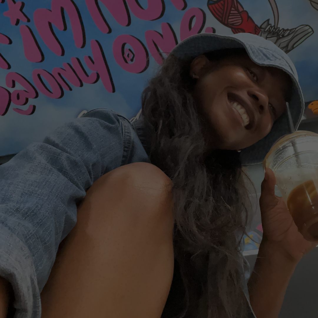 Bridgette enjoying iced coffee from Shift Espresso while dropping off sneakers for a clean by Shoe Rehab.