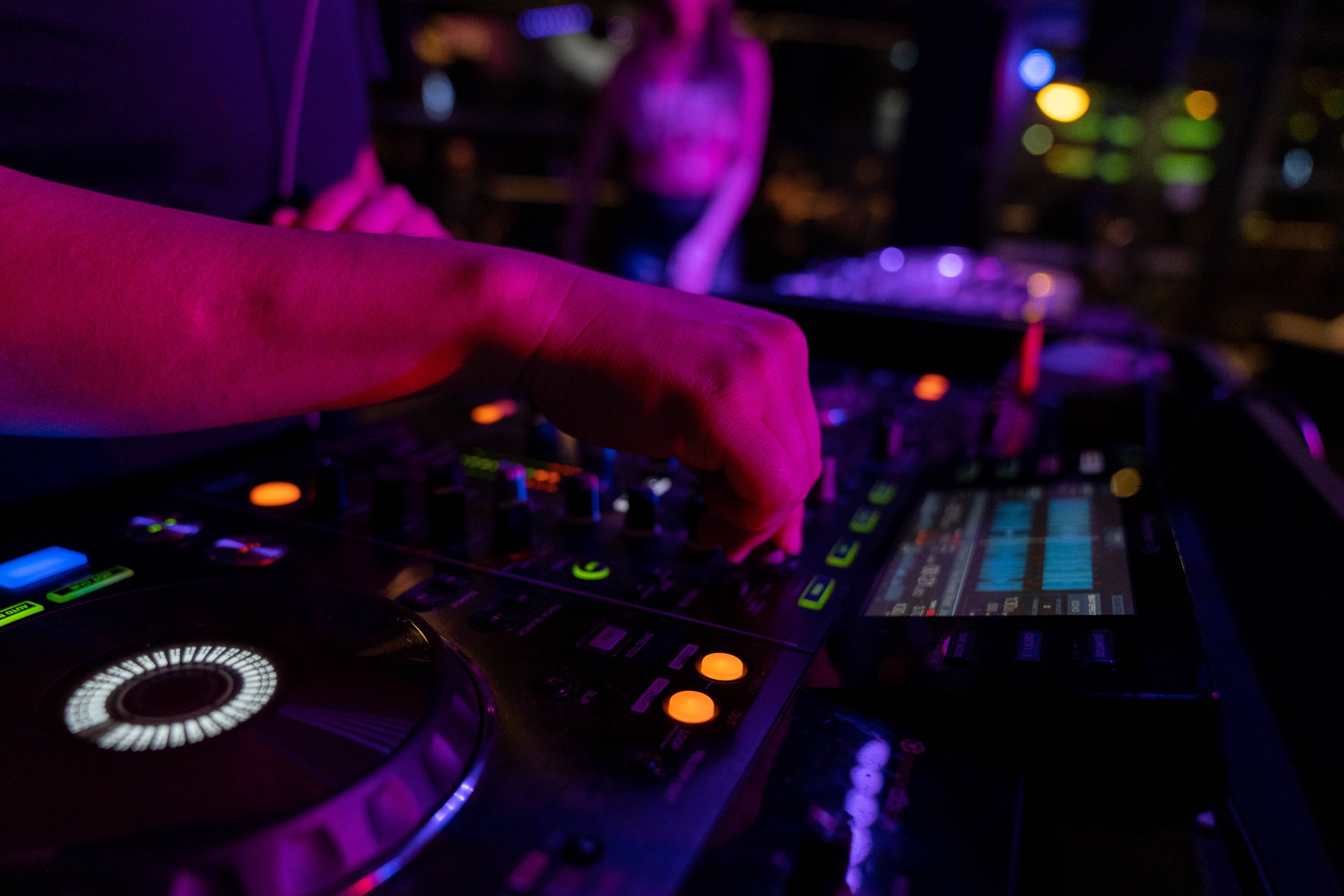 DJ using mixing deck