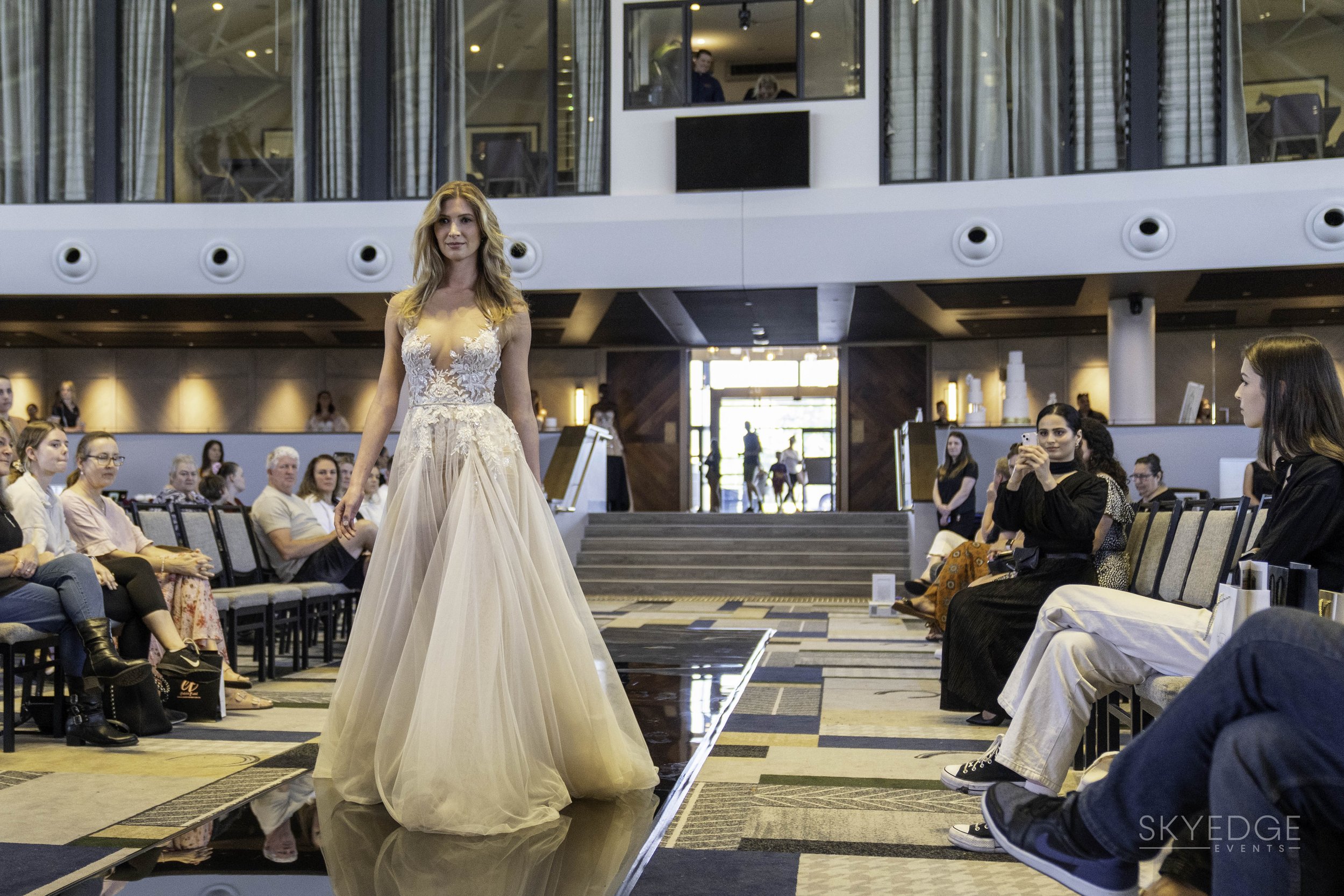model walking down runway