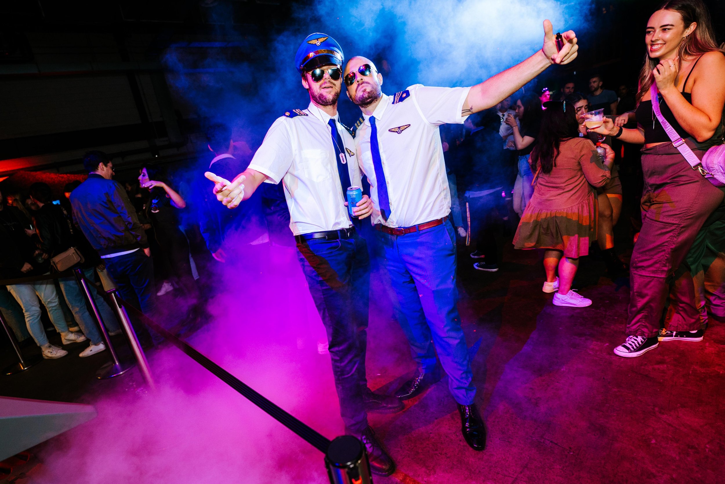 2 people dressed up at pilots