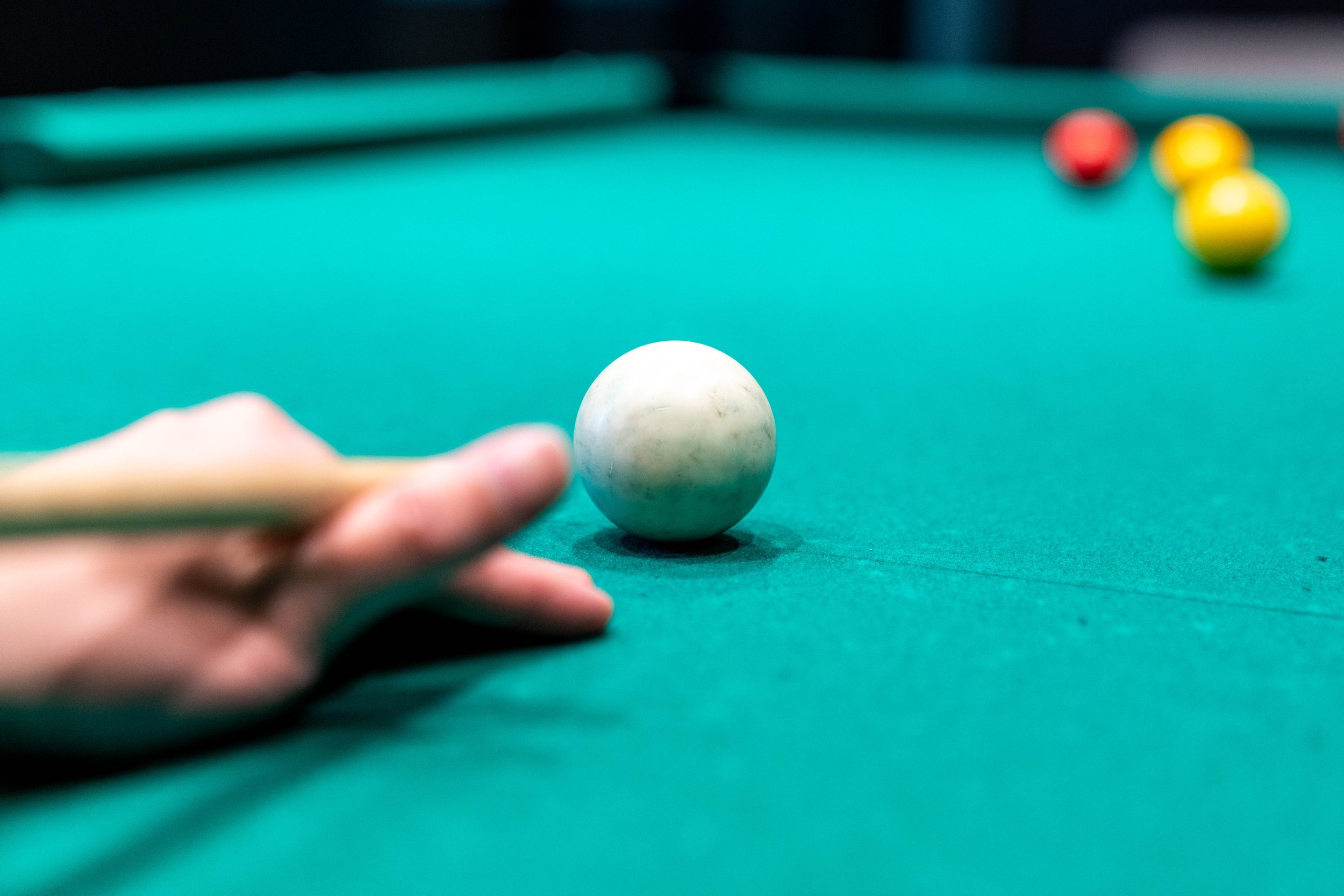 about to hit billiard ball