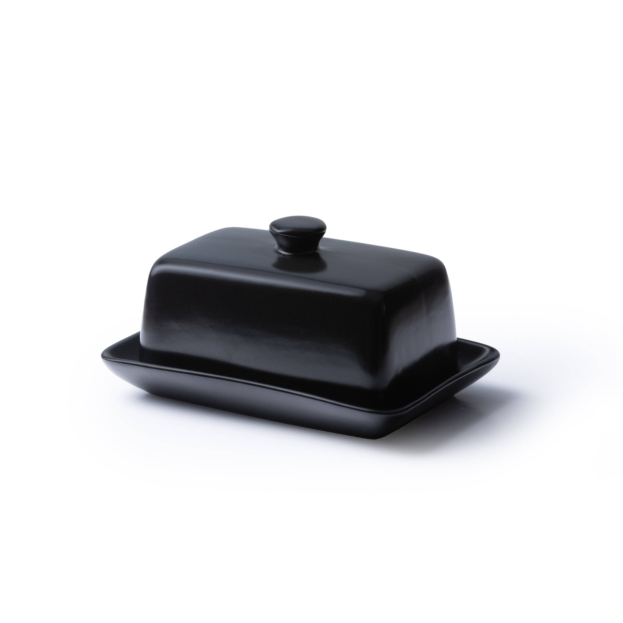 A black ceramic butter dish commercial product pack on white background shot by Bakkes Images, Stellenbosch studio.
