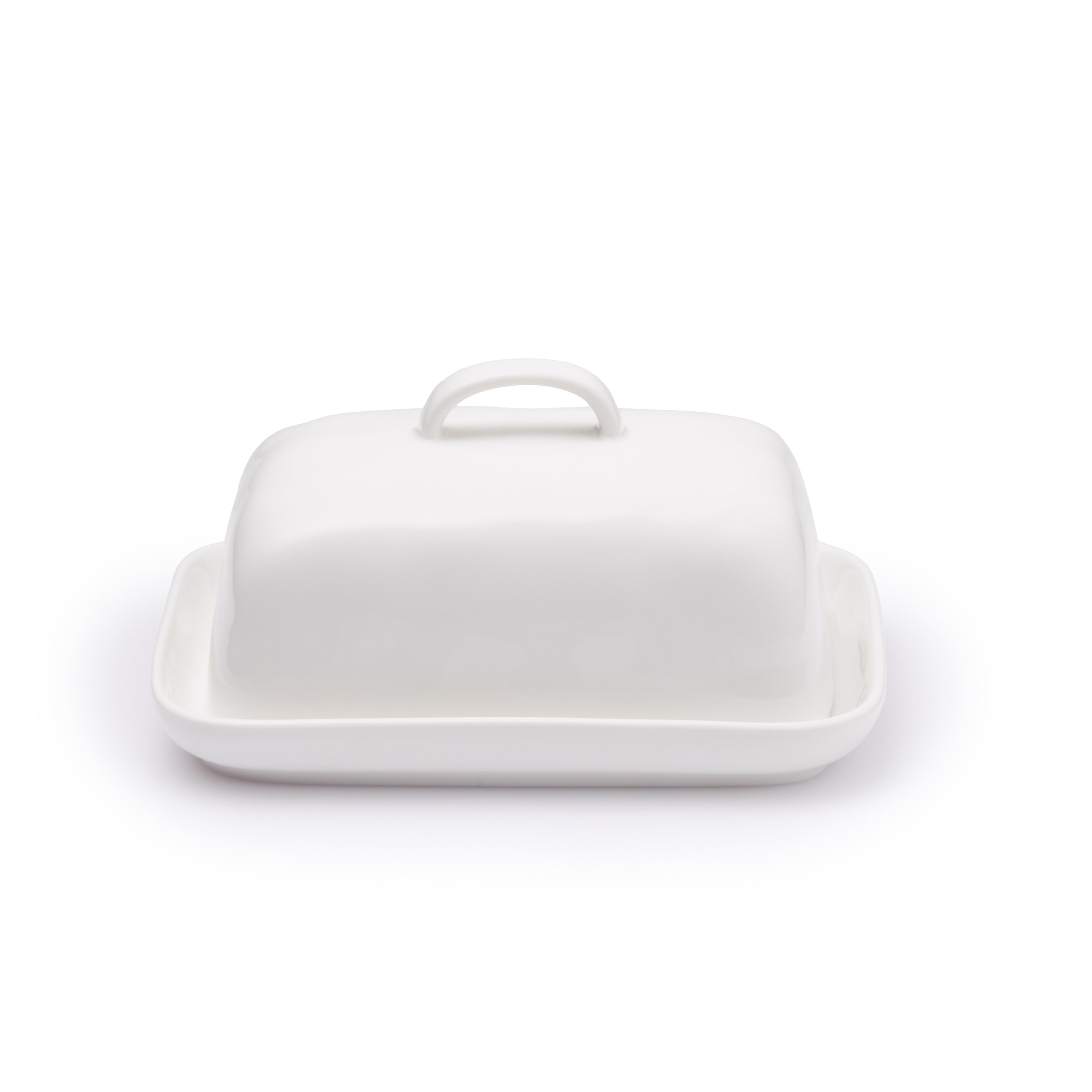 A white ceramic Butter dish commercial product pack on white background shot by Bakkes Images, Stellenbosch.