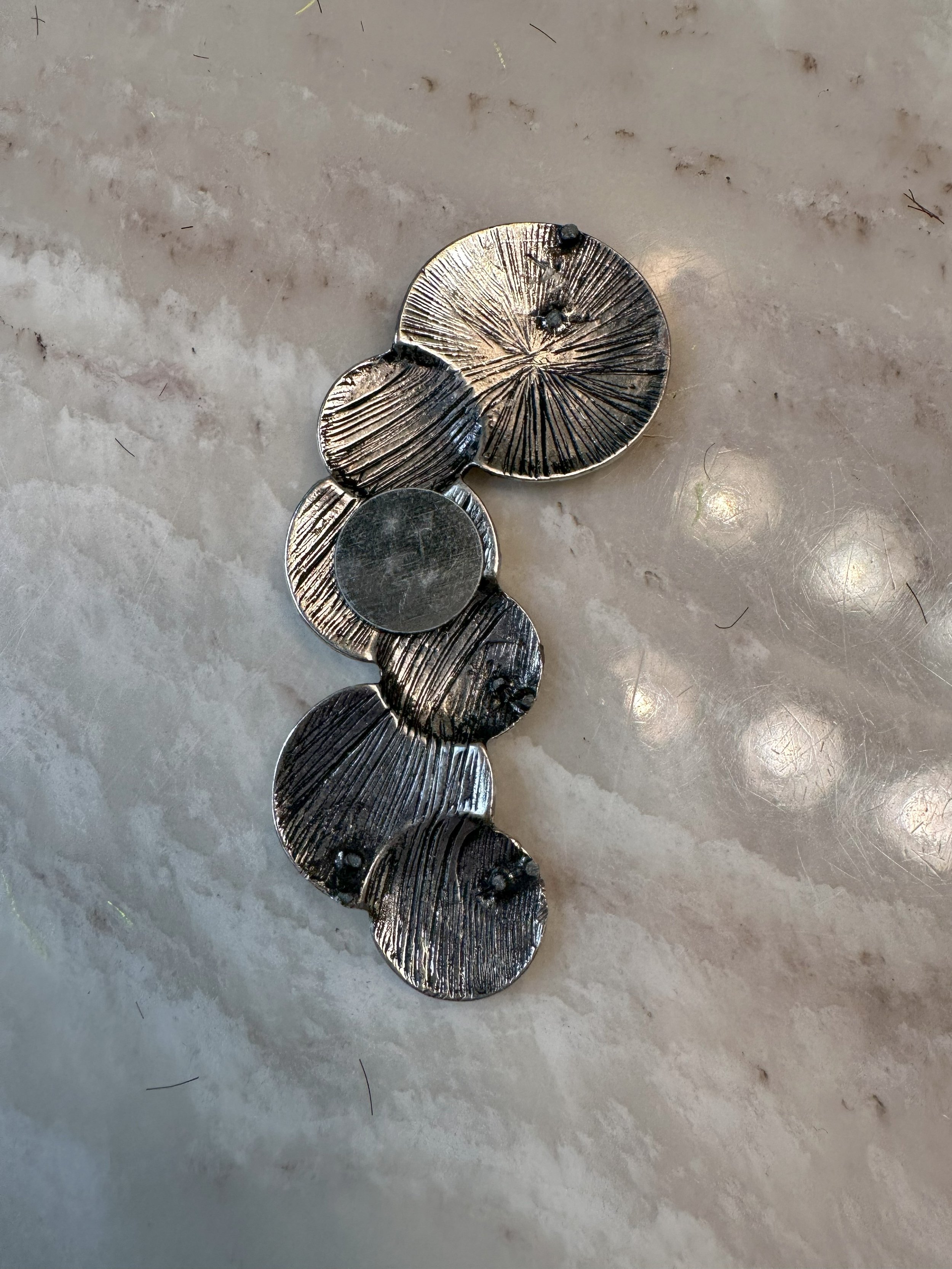 Back of burnt silver.jpg